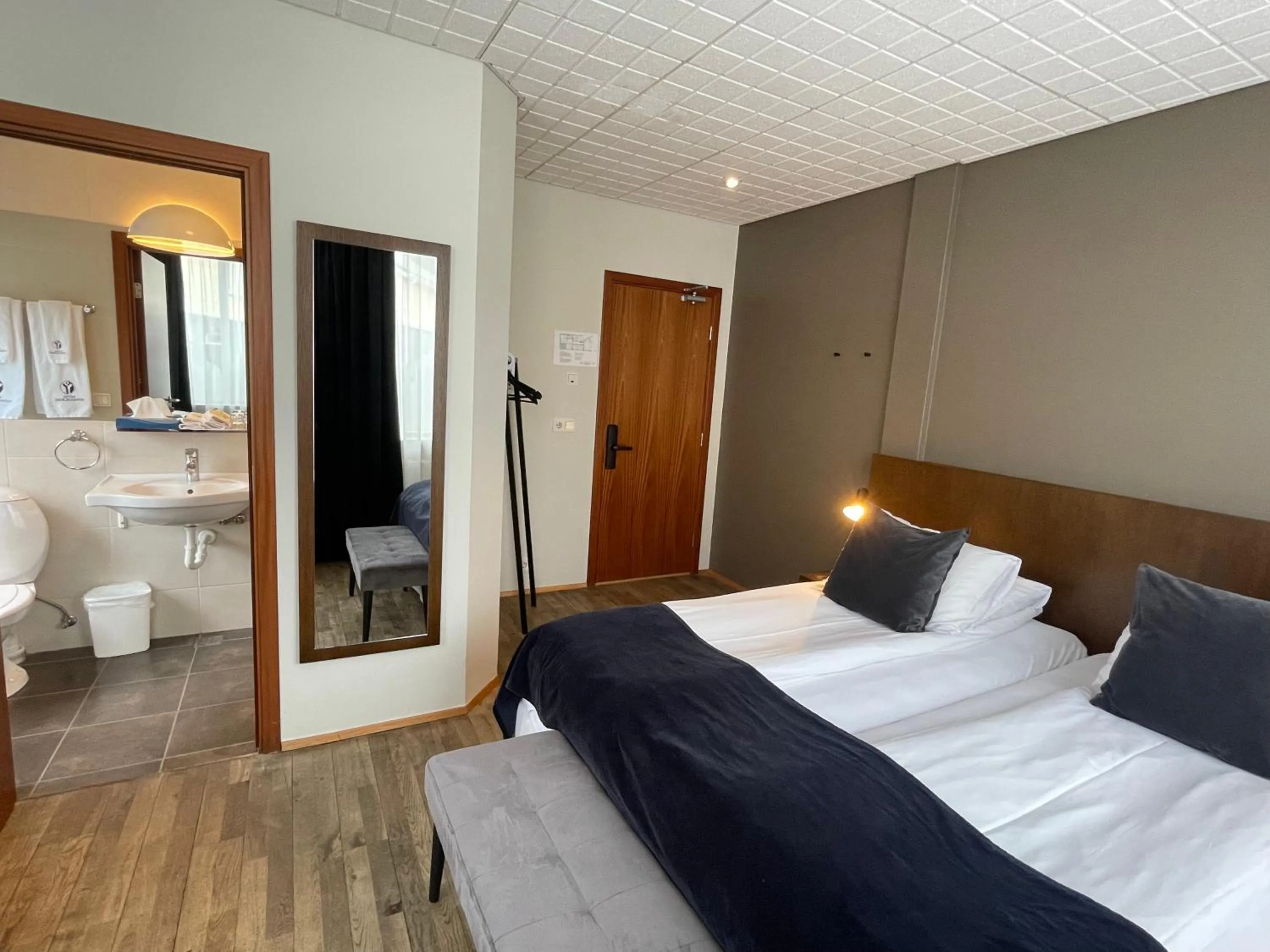 Photo of the whole room, Bed in Hotel Norðurland