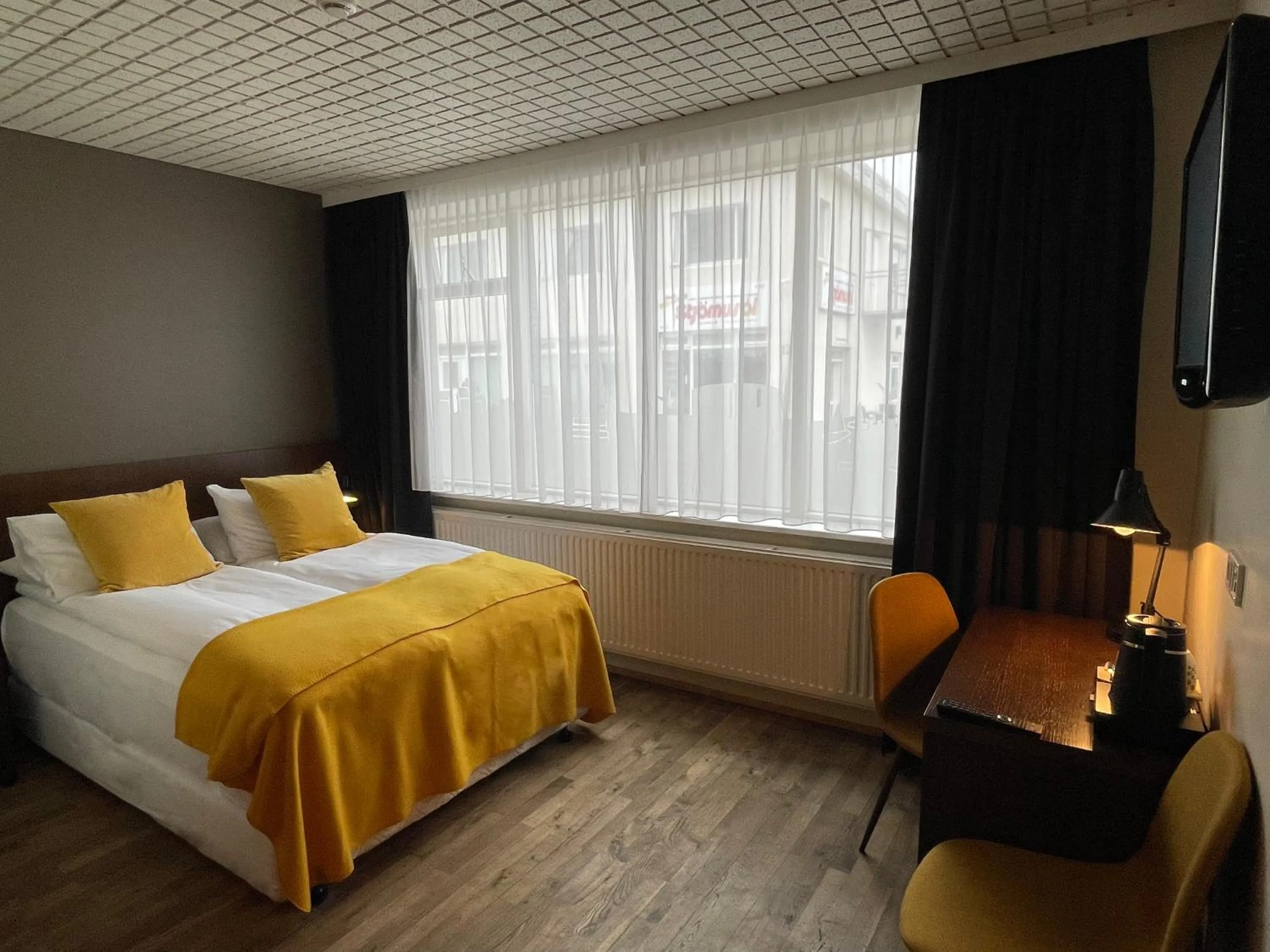 Photo of the whole room, Bed in Hotel Norðurland