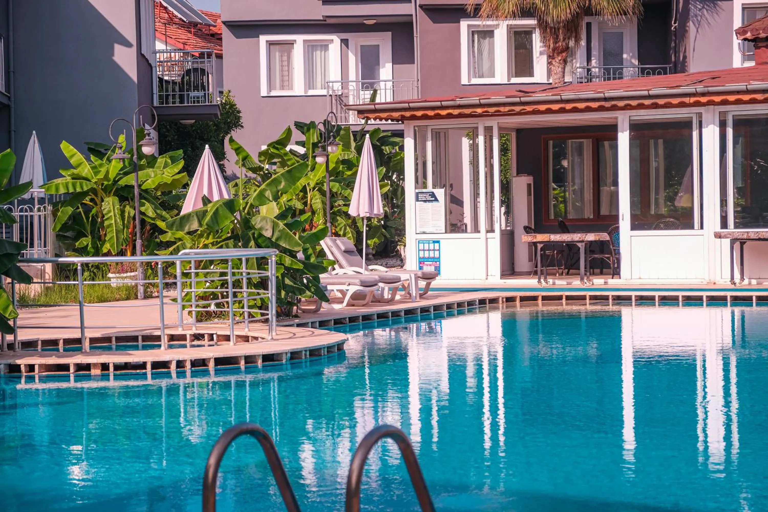 Swimming pool in ÖZCEM APART HOTEL FETHİYE