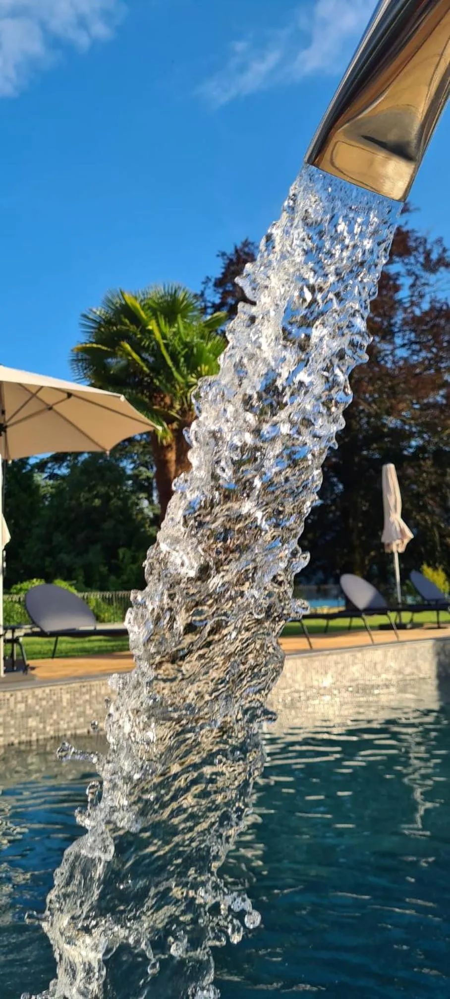 Swimming pool in Hôtel Le Mouton Bleu