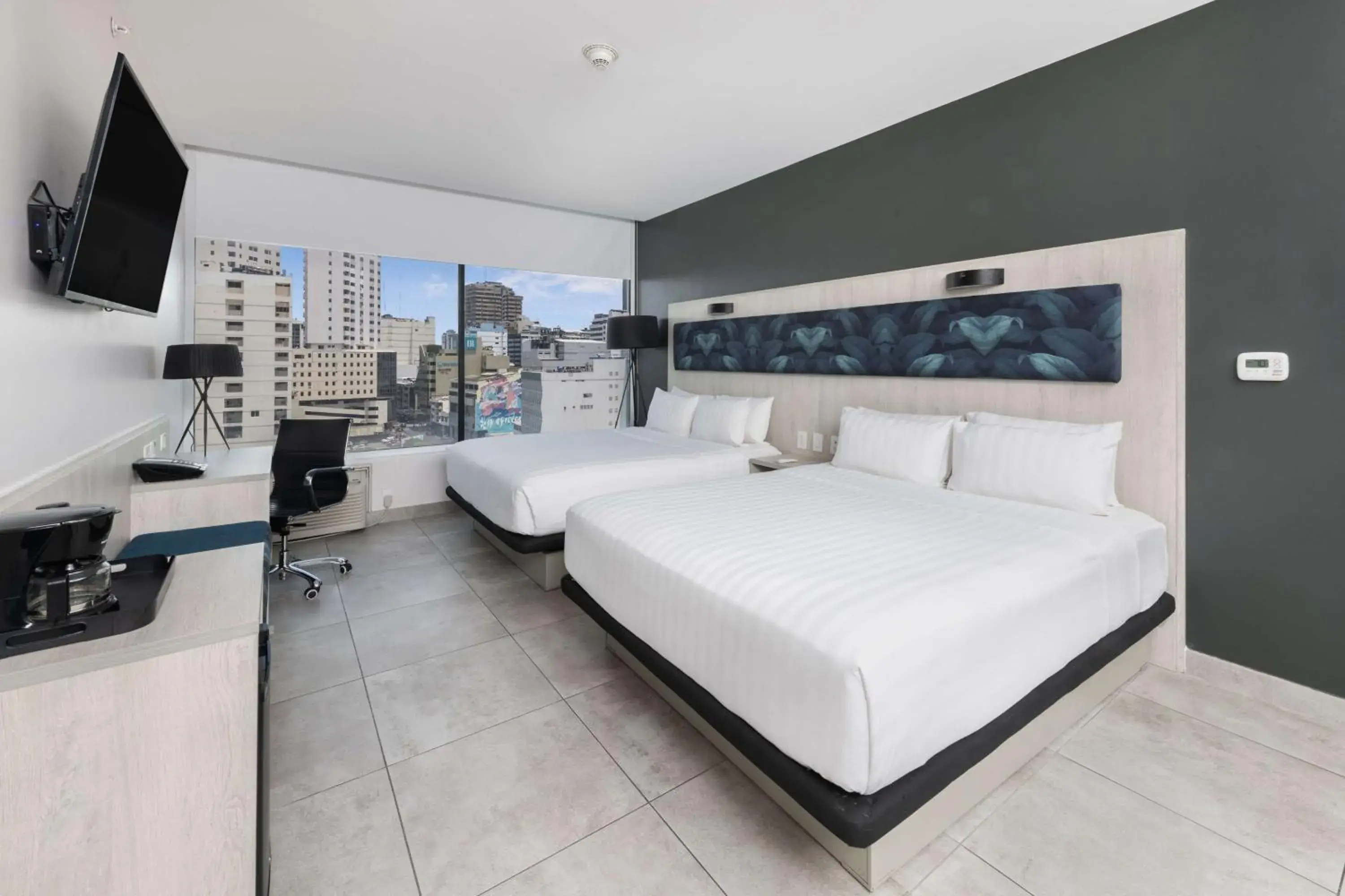 Queen Room with Two Queen Beds in River Garden Hotel + Suites Queen Room with Two Queen Beds in River Garden Hotel + Suites