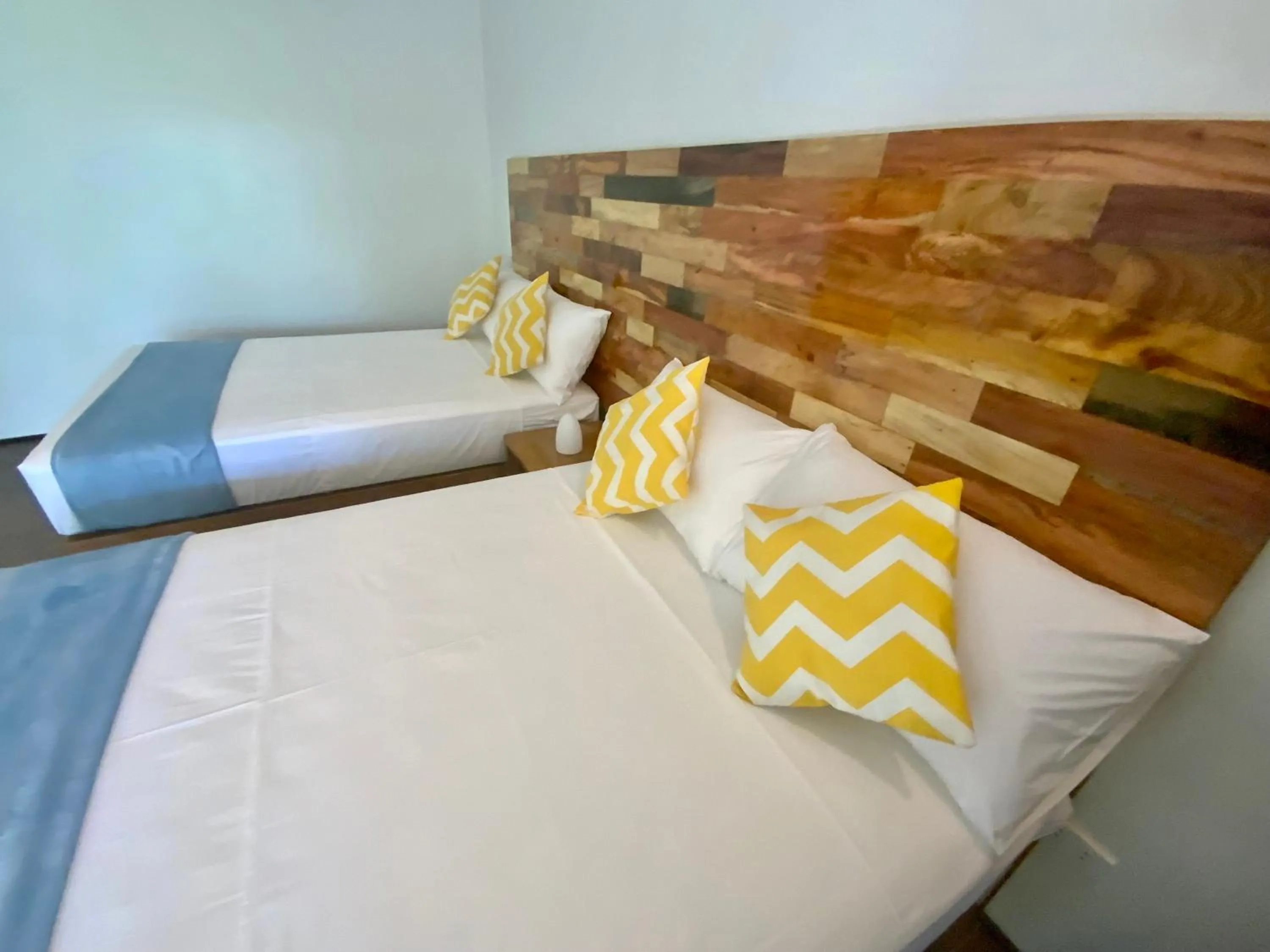 Bed in Tuburan Cove Beach Resort