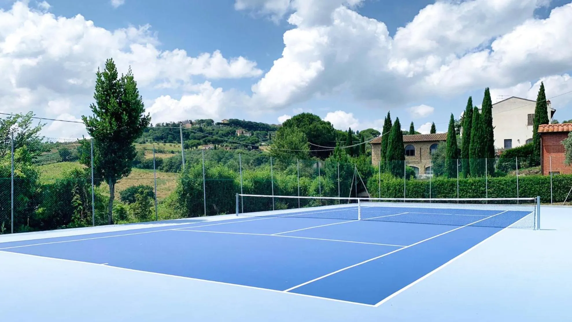 Tennis court in GHIZZOLO Residence - Refurbished Pool 2025