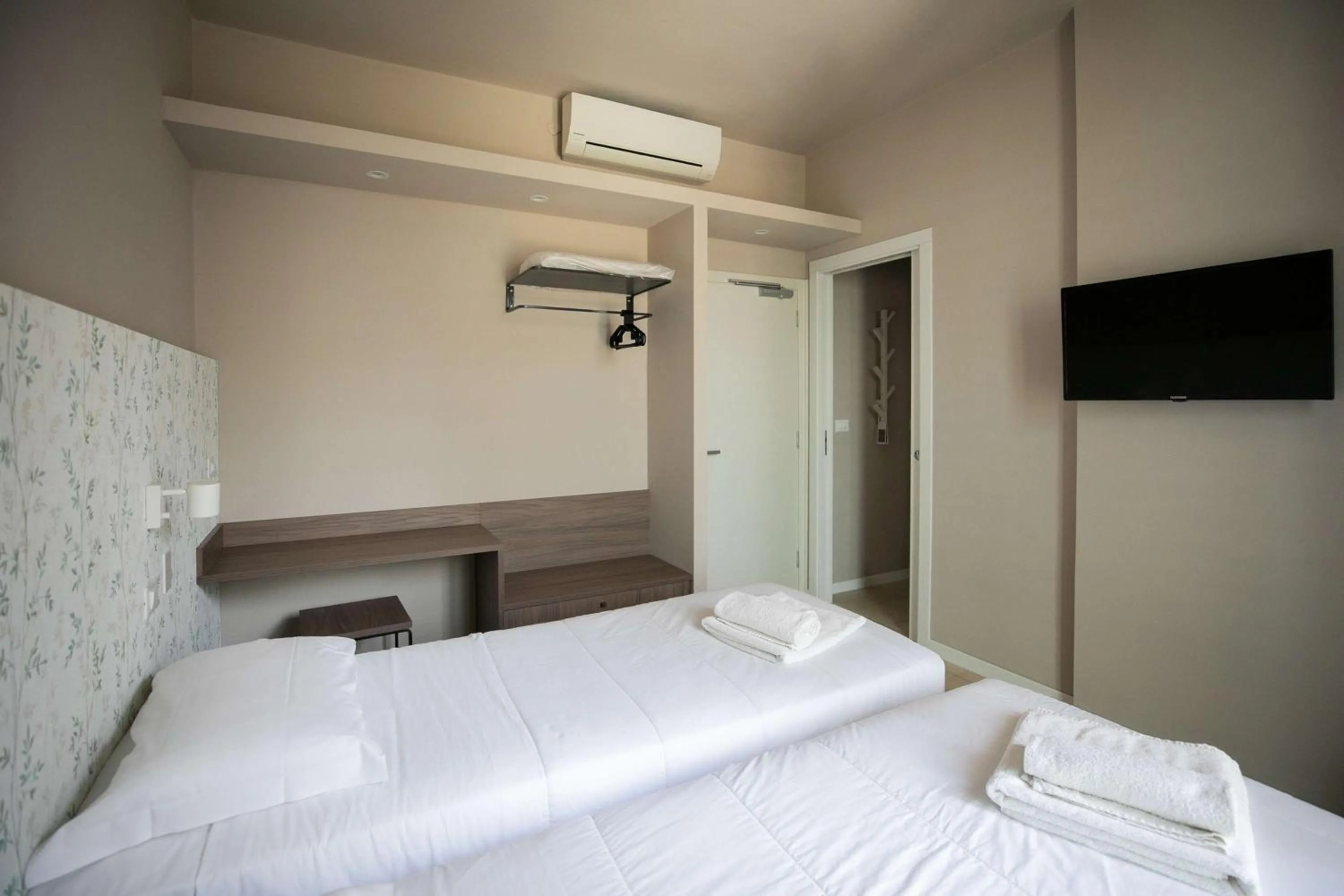 Bed in Hotel Benvenuto