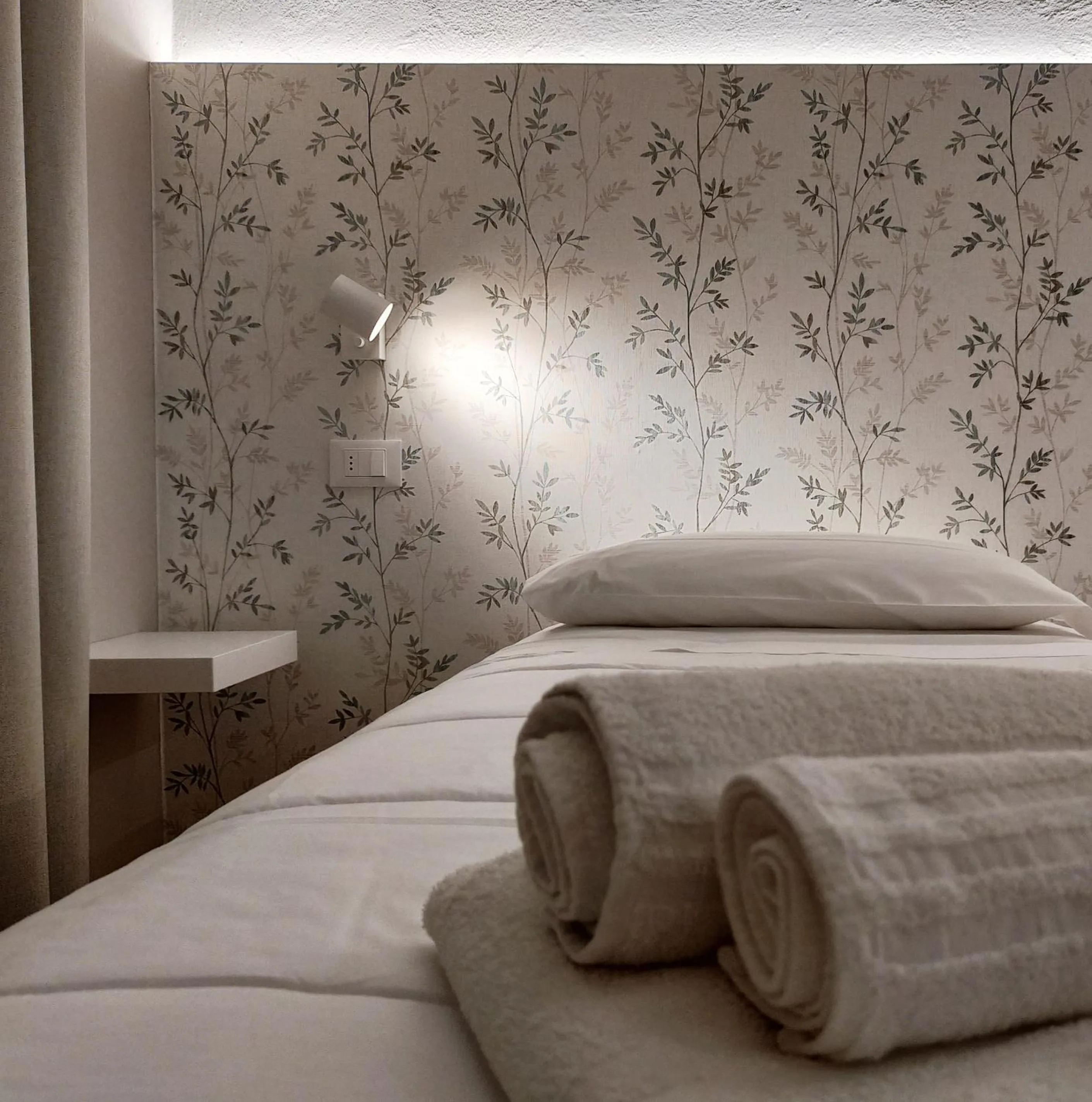 Bed in Hotel Benvenuto