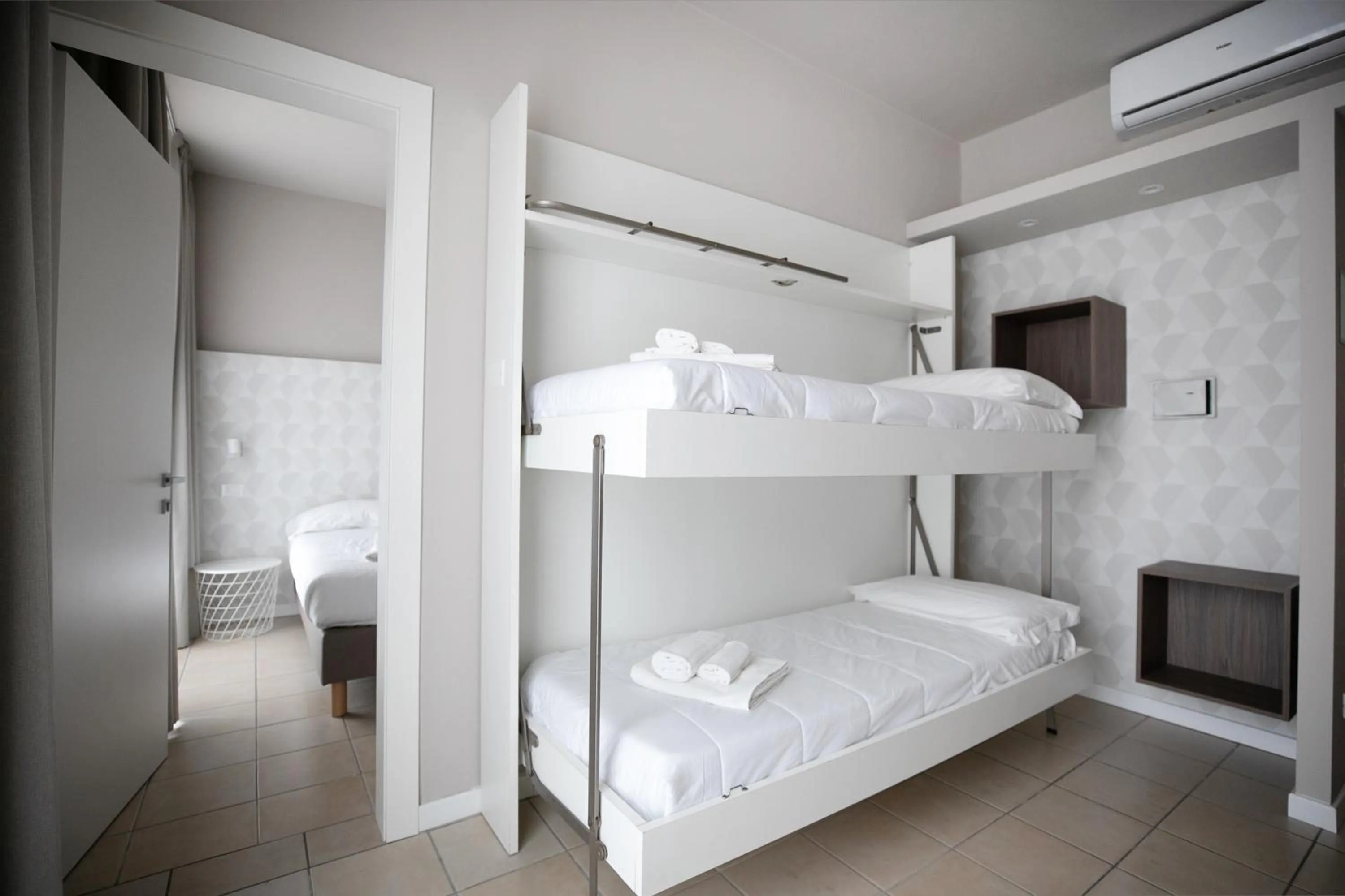 Bed in Hotel Benvenuto