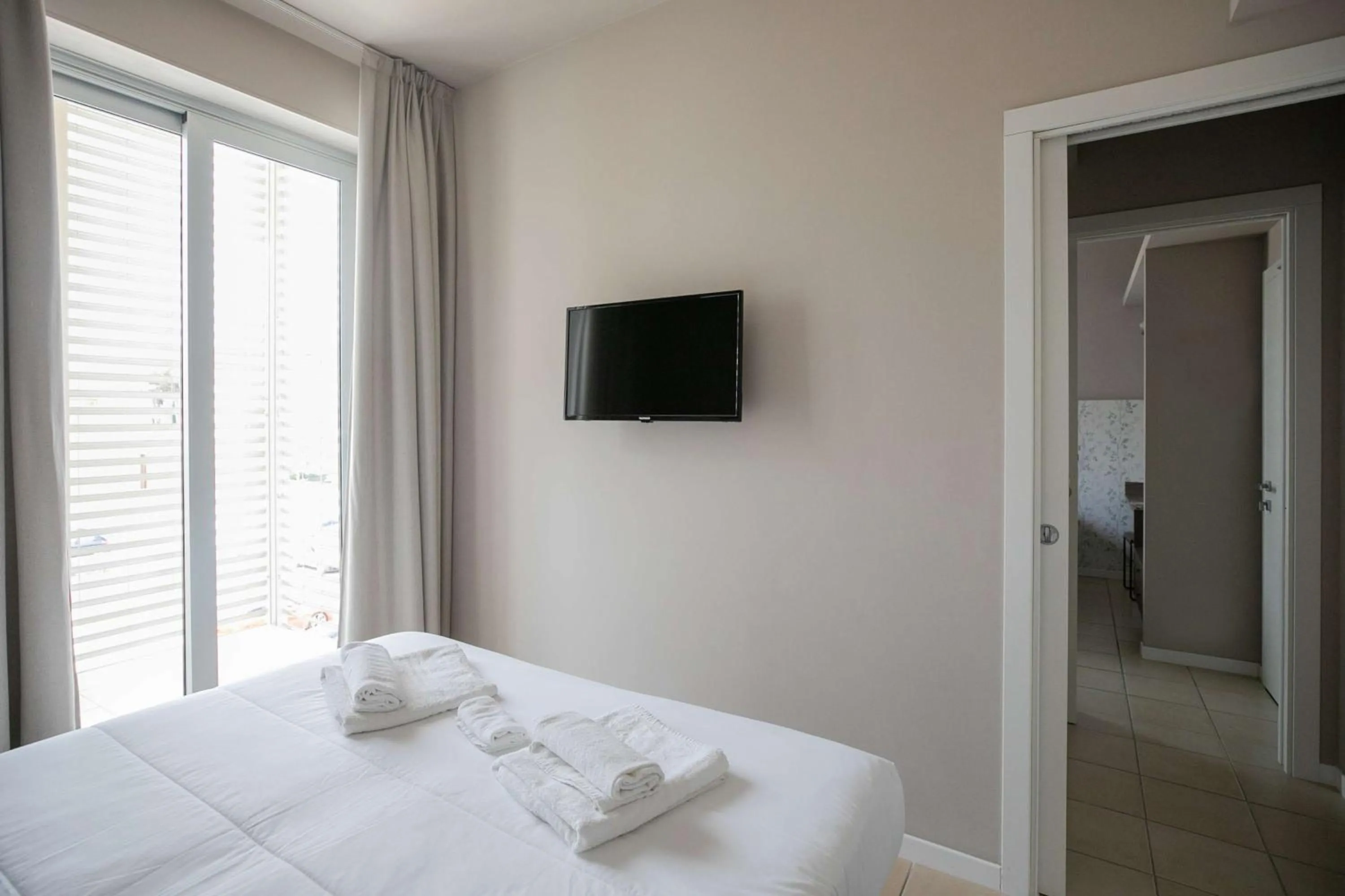 Bed in Hotel Benvenuto