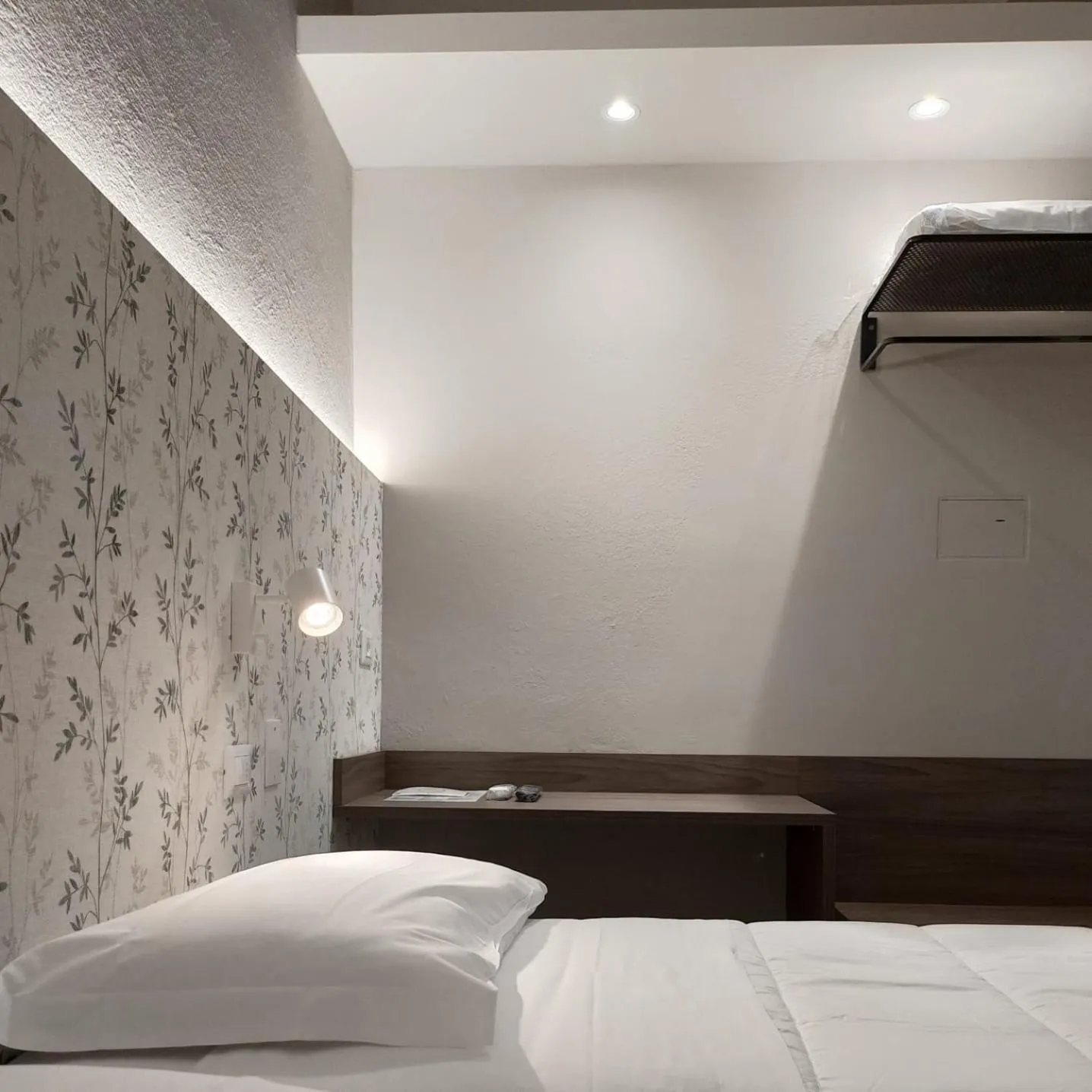 Bed in Hotel Benvenuto