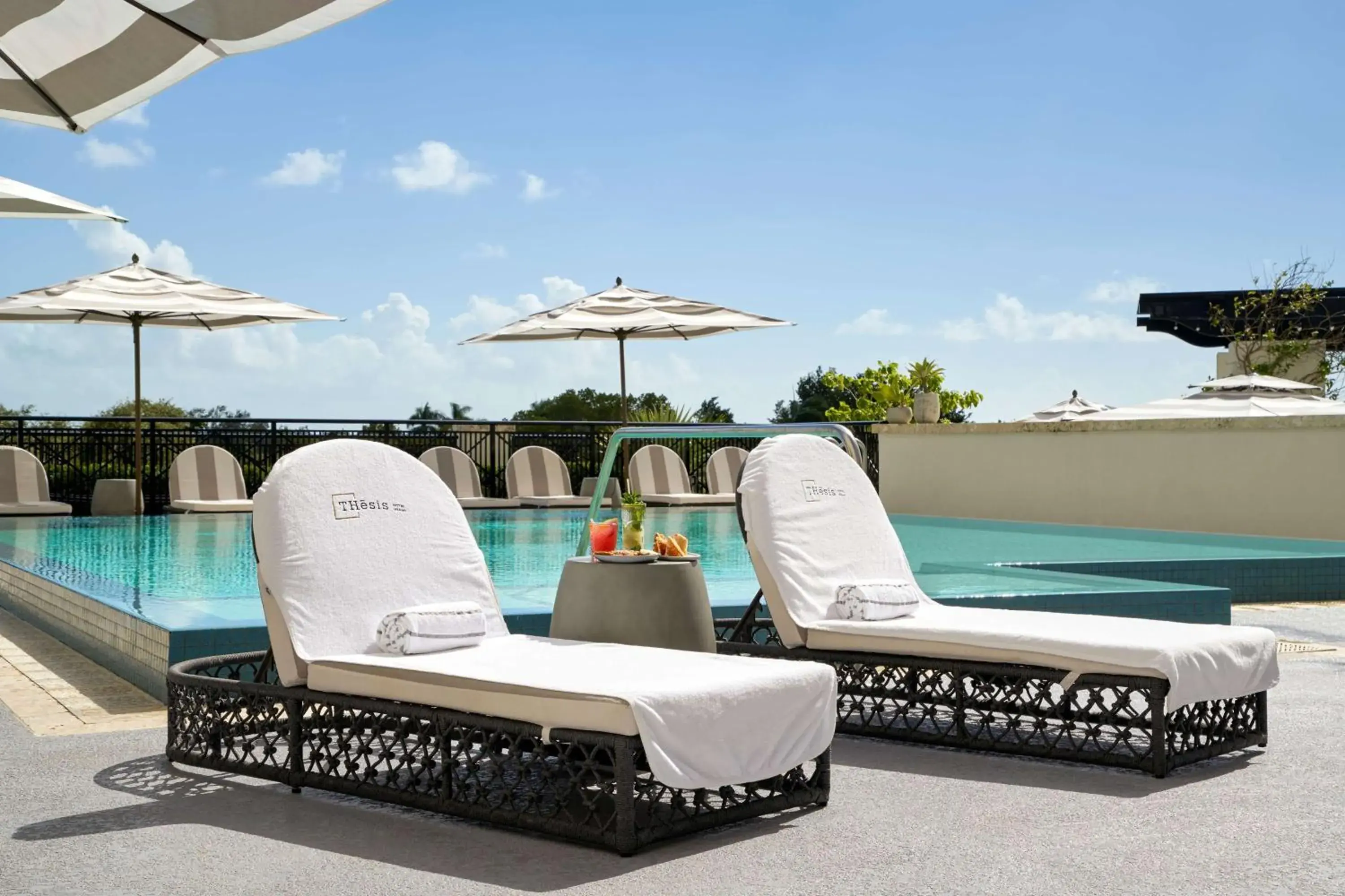 Pool view in THesis Hotel Miami Coral Gables, Curio Collection by Hilton Pool view in THesis Hotel Miami Coral Gables, Curio Collection by Hilton
