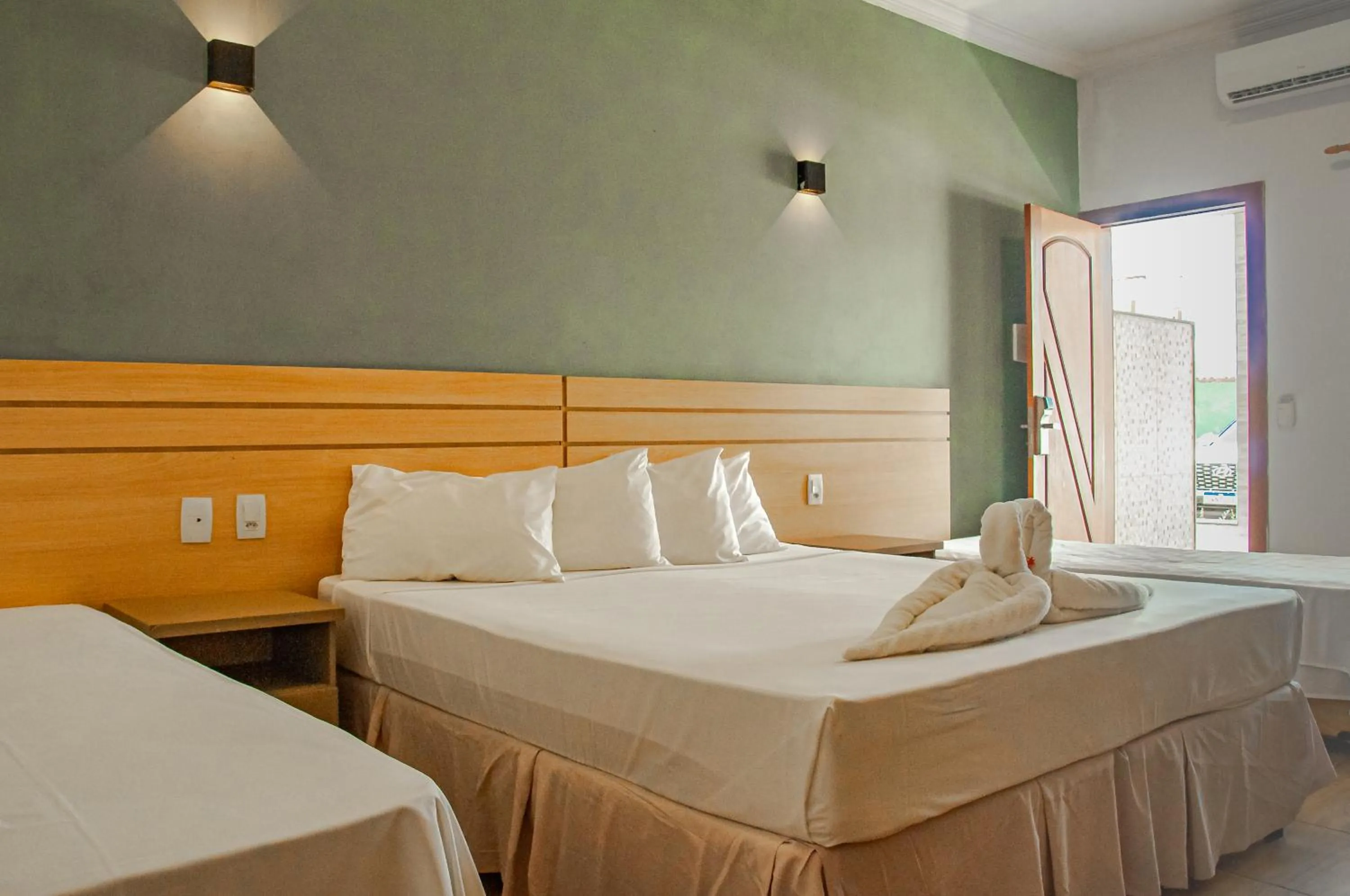 Bed in Porto Mar Hotel