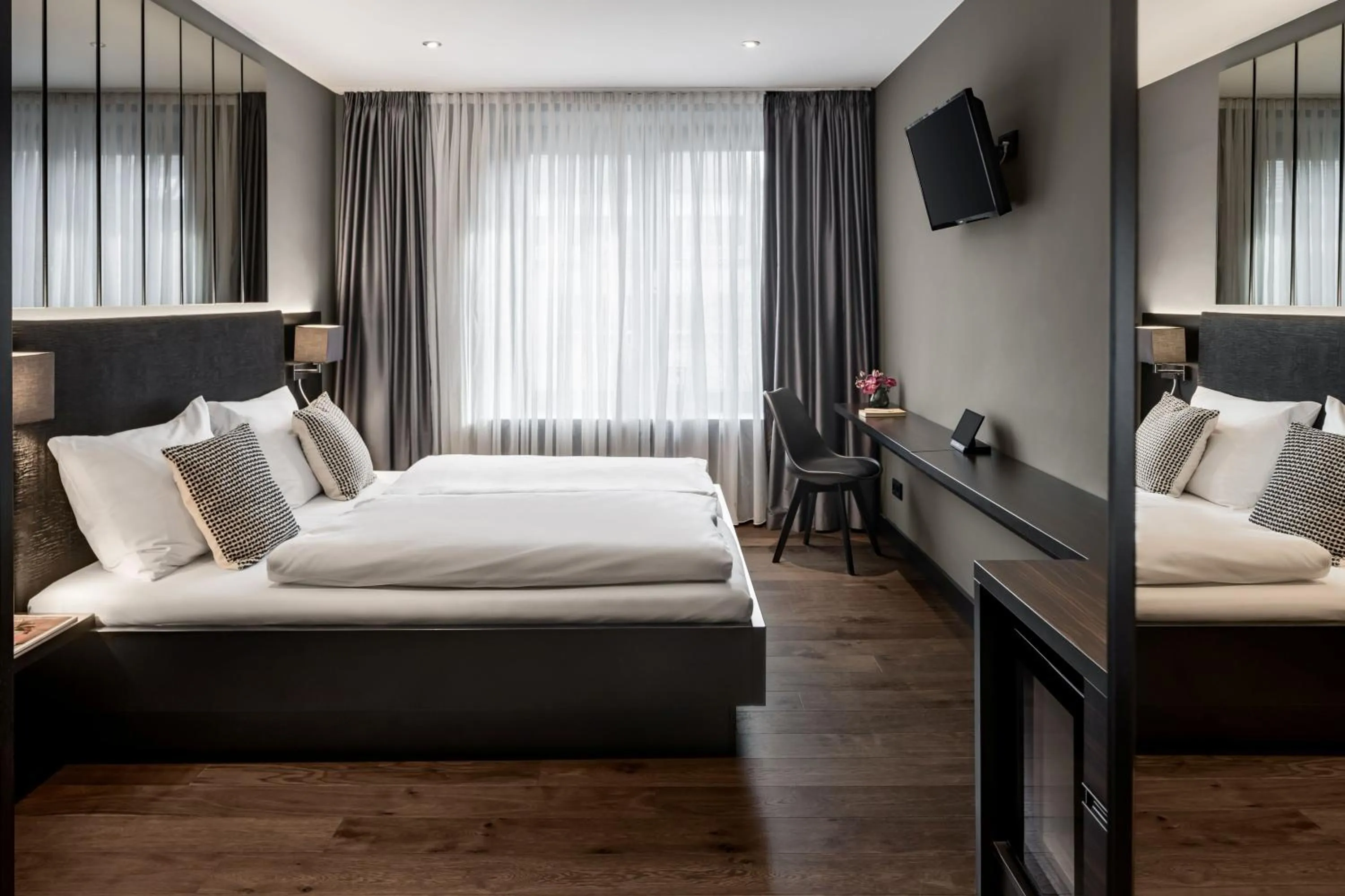 Bed in Hotel AMANO Düsseldorf