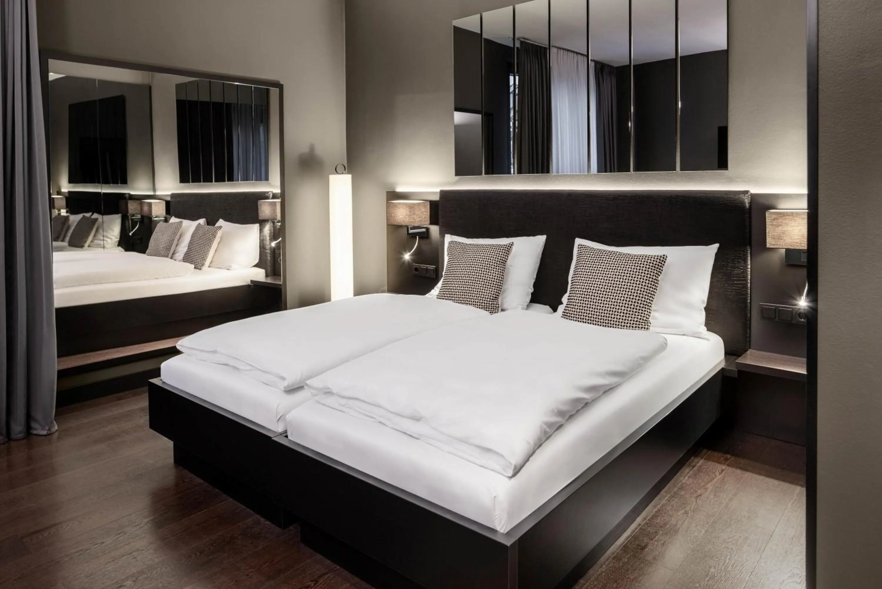 Bed in Hotel AMANO Düsseldorf