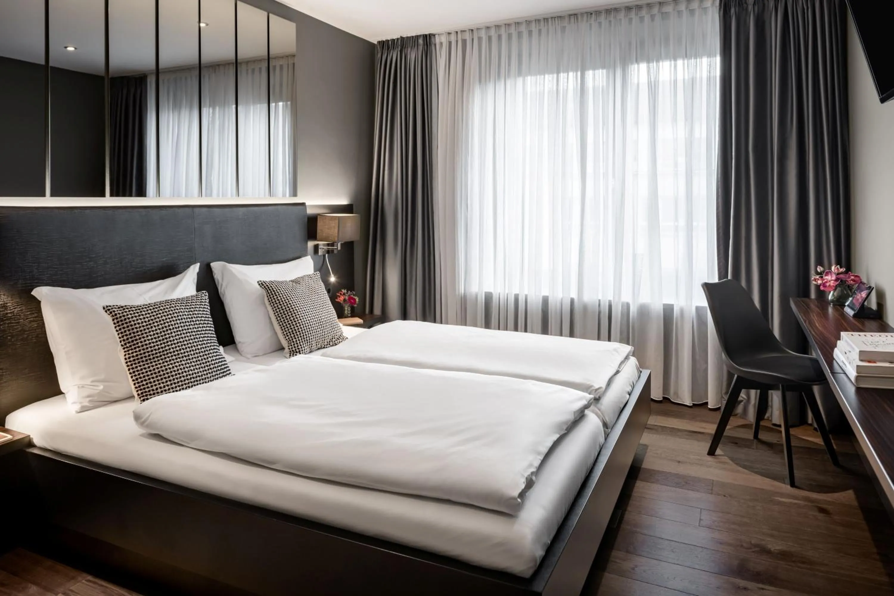 Bed in Hotel AMANO Düsseldorf