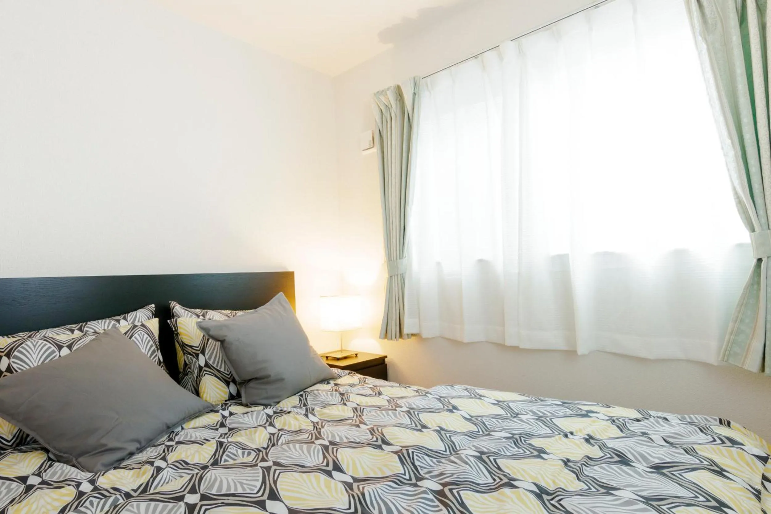 Bed in Crescent Moon Nakanoshimbashi