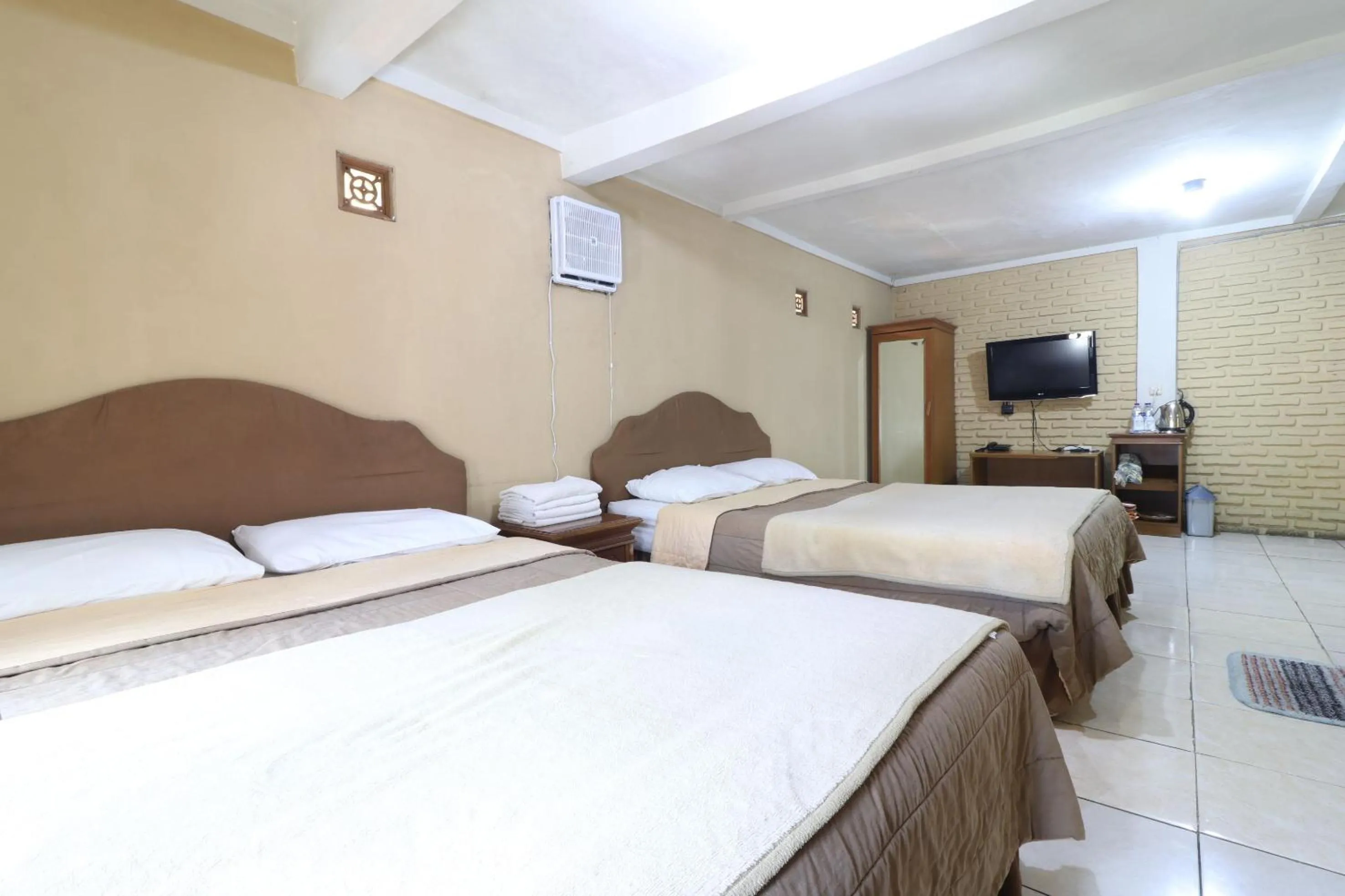 Photo of the whole room, Bed in Kampung Pa'go Resort Hotel