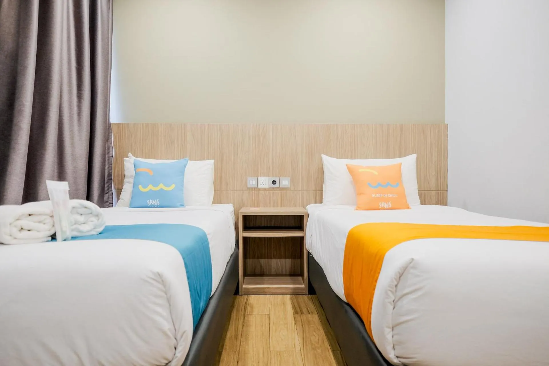 Photo of the whole room, Bed in Sans Hotel Puri Indah Jakarta