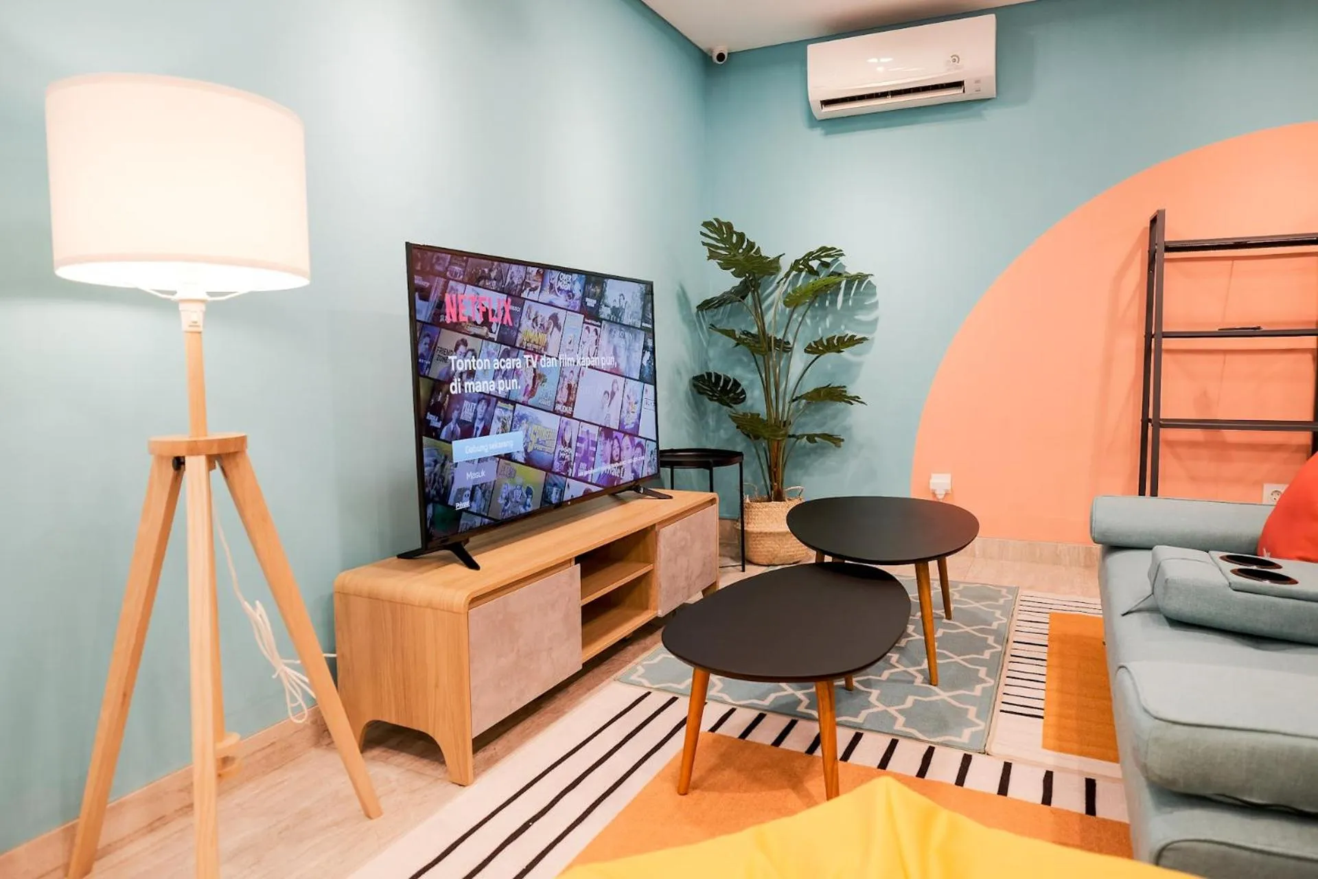 Communal lounge/ TV room in Sans Hotel Puri Indah Jakarta