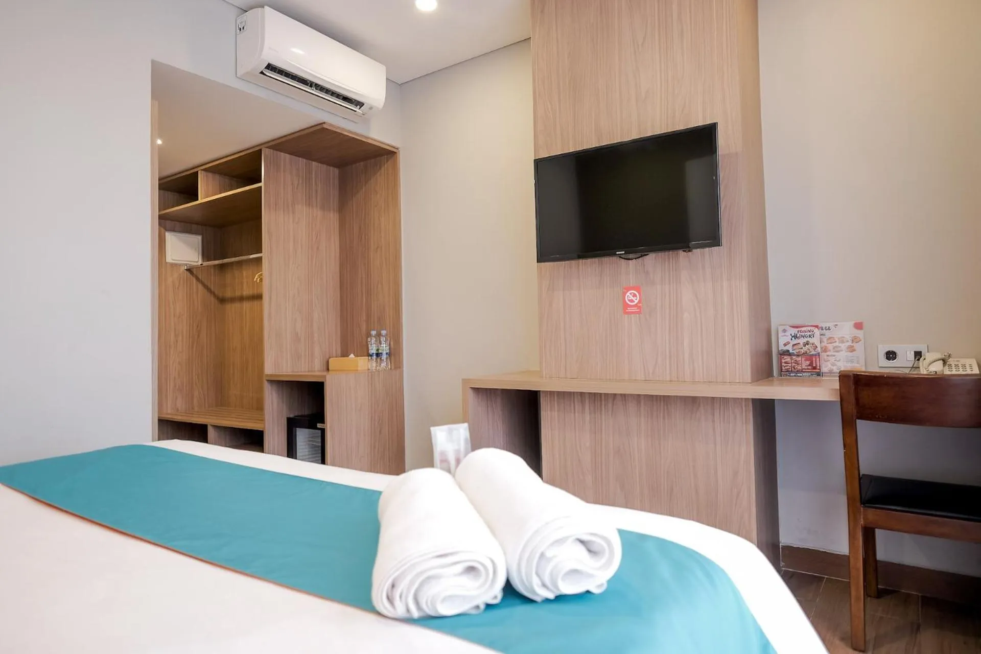 Bedroom, Bed in Sans Hotel Puri Indah Jakarta