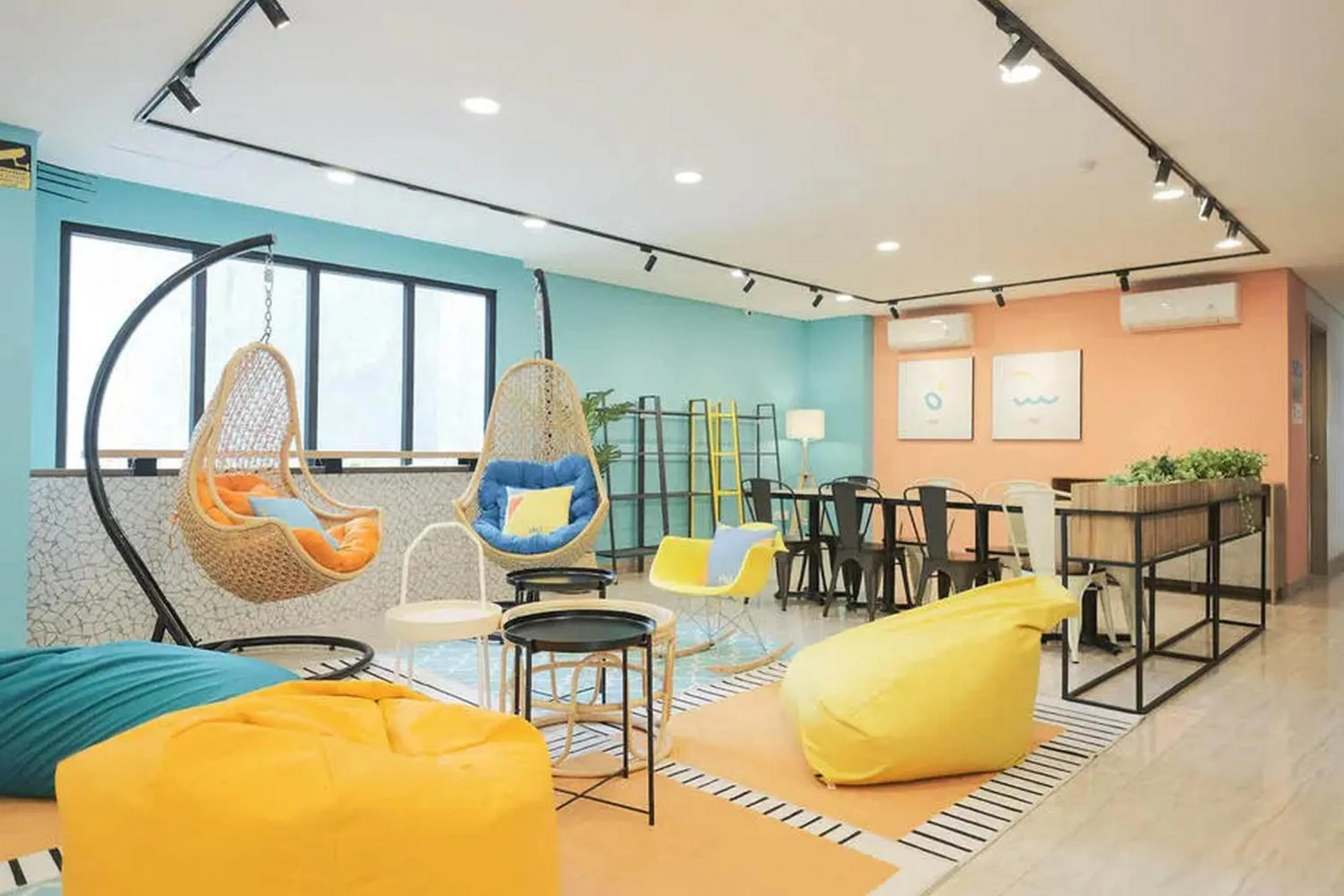 Seating area in Sans Hotel Puri Indah Jakarta