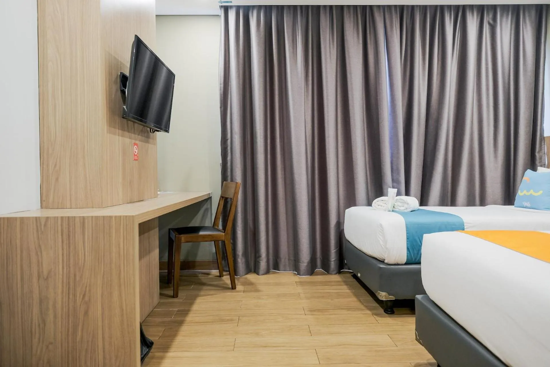 Photo of the whole room, Bed in Sans Hotel Puri Indah Jakarta