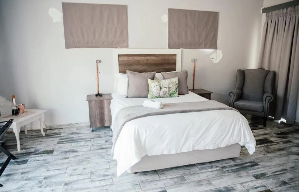 Bed in The Perfect Corner Guesthouse