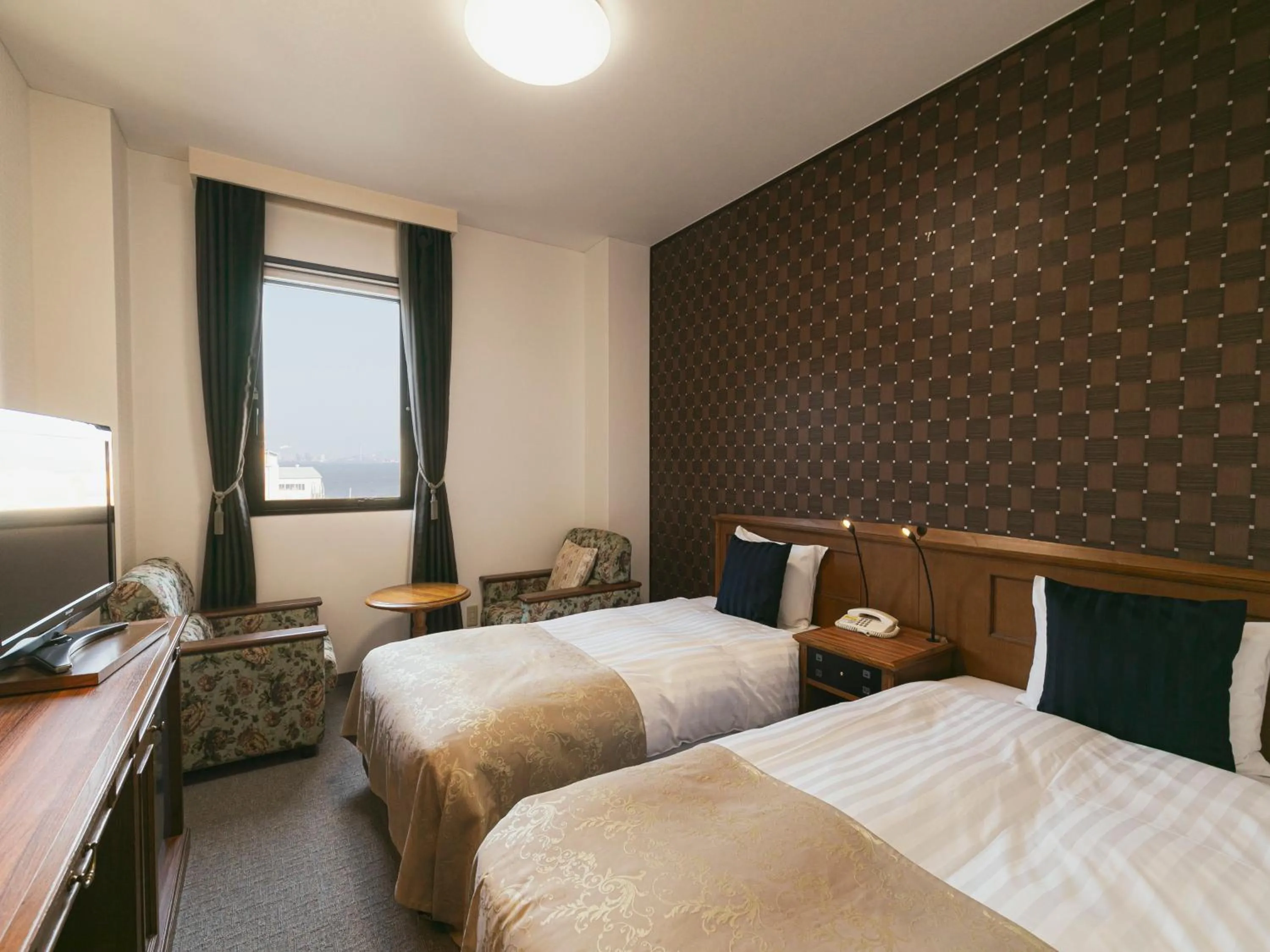 Bed in Hotel Arthur KITAHAMA BASE