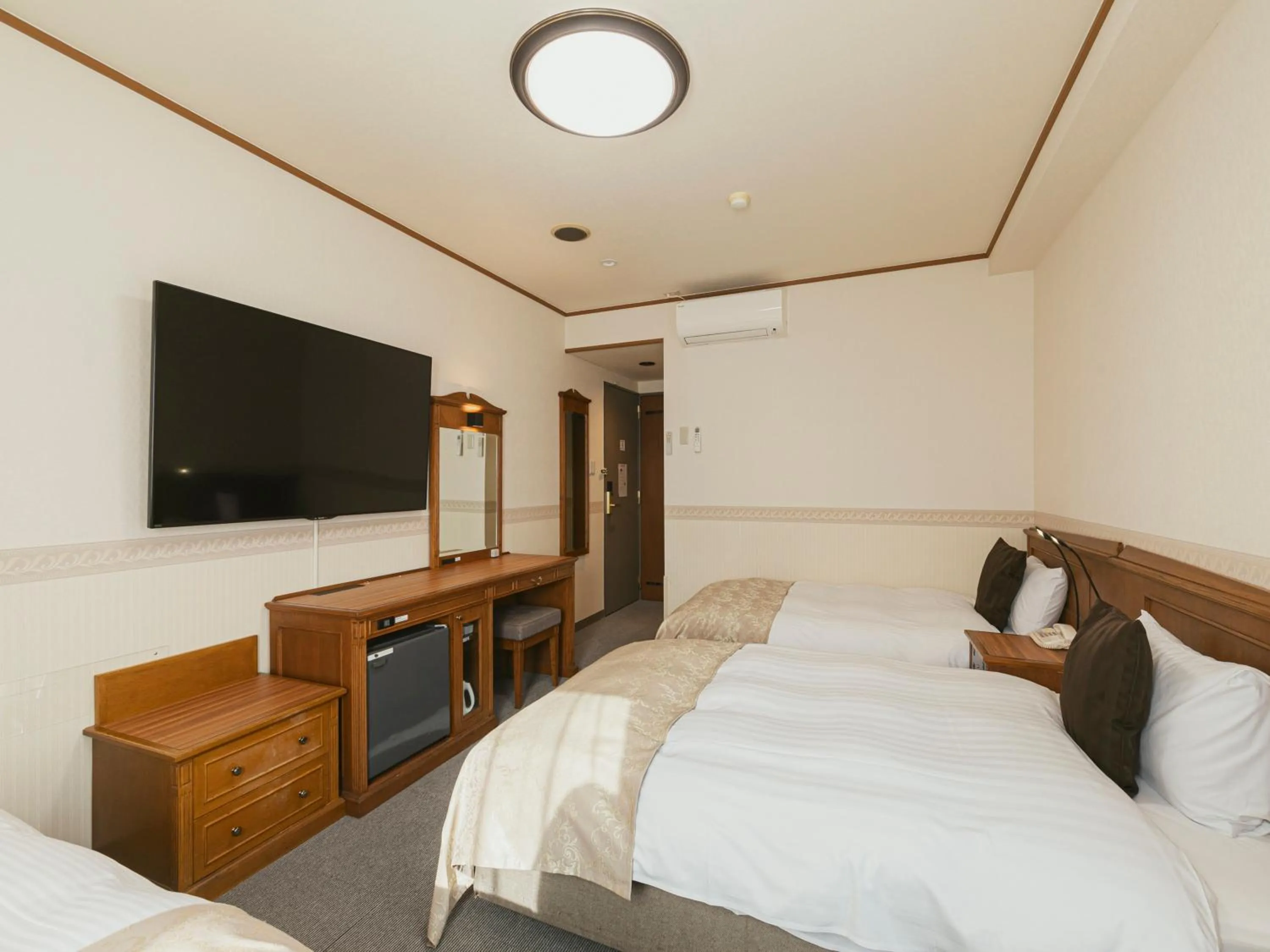 Bed in Hotel Arthur KITAHAMA BASE