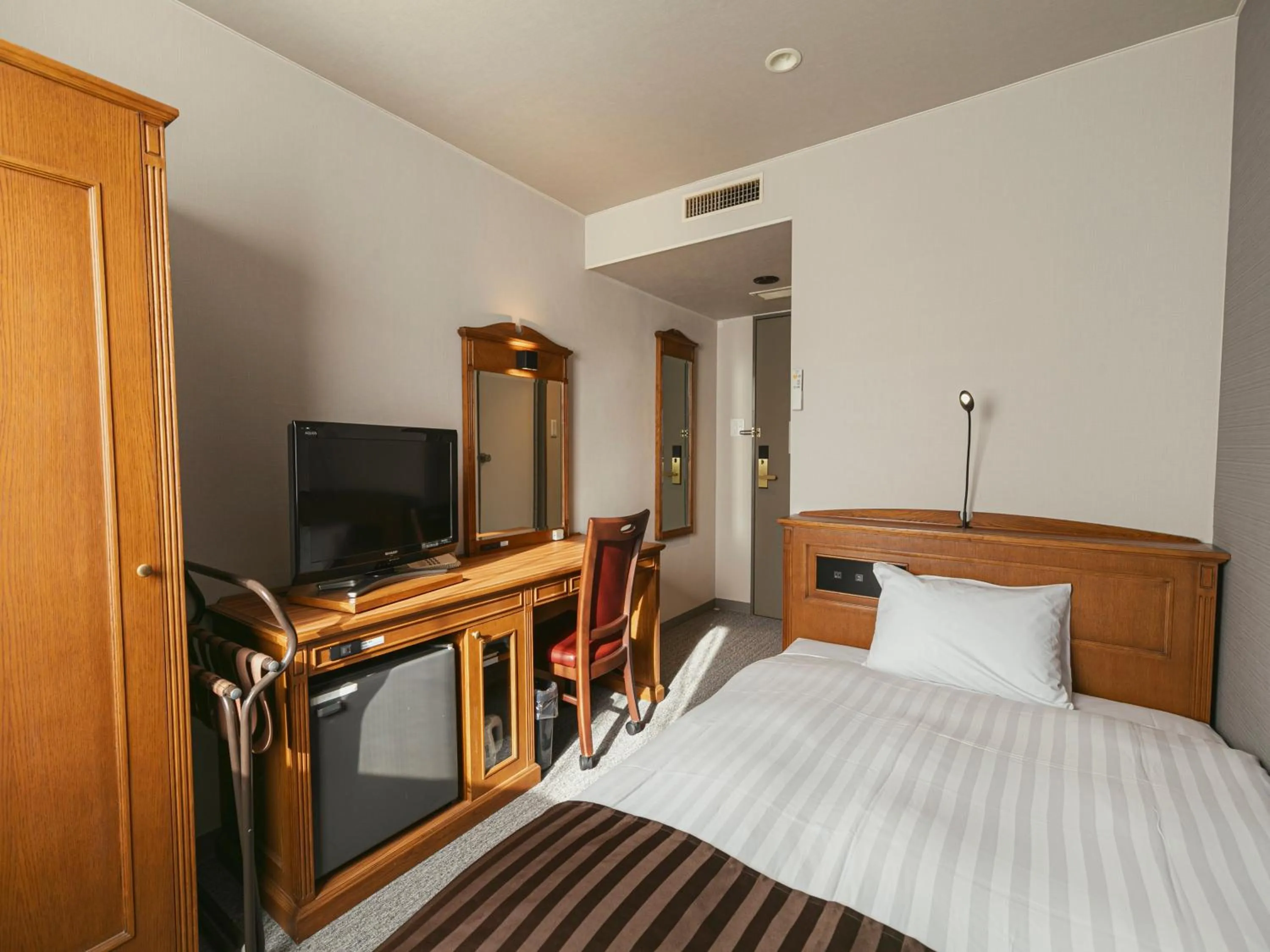 Bed in Hotel Arthur KITAHAMA BASE