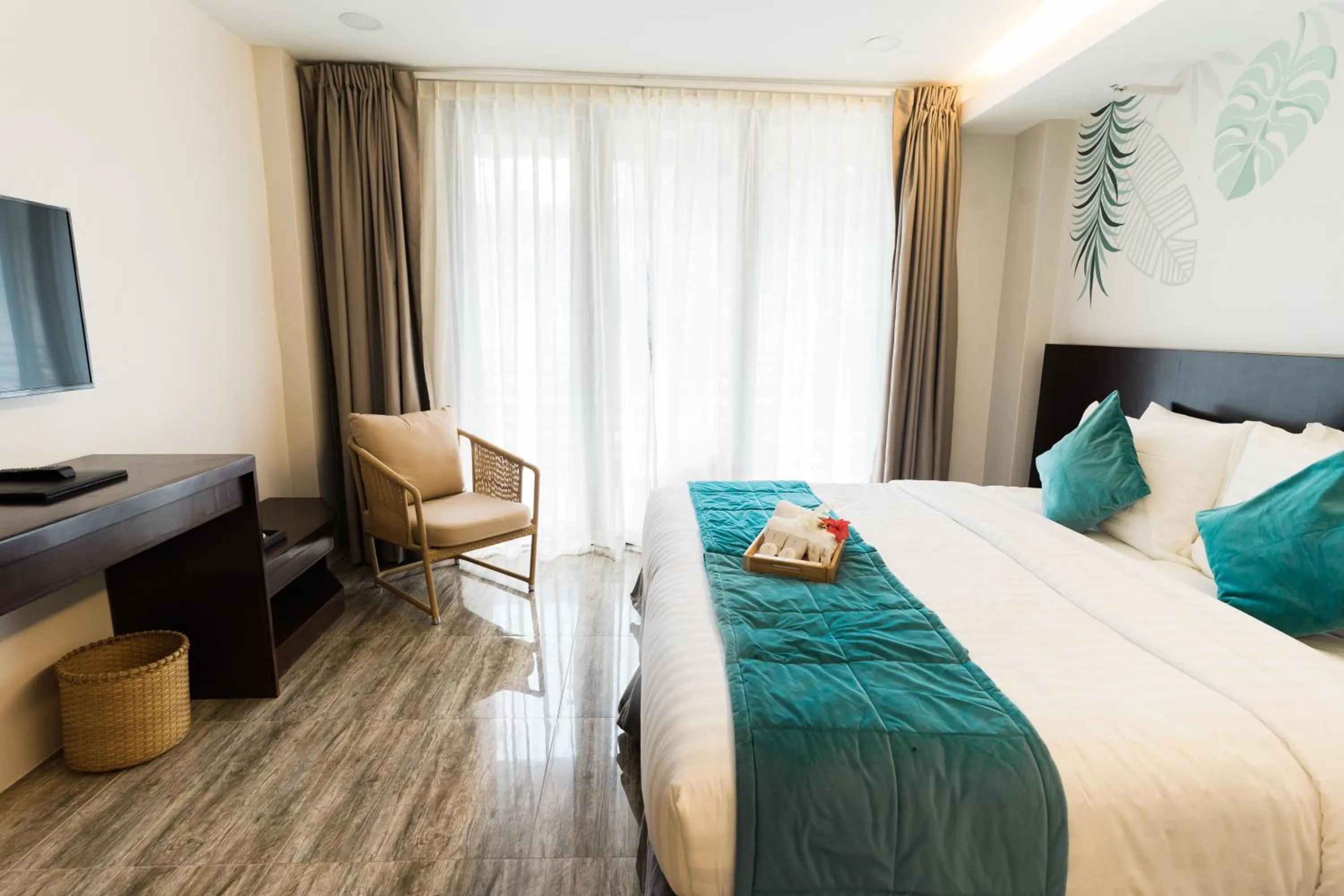 Bed in Holiday Suites Port Barton