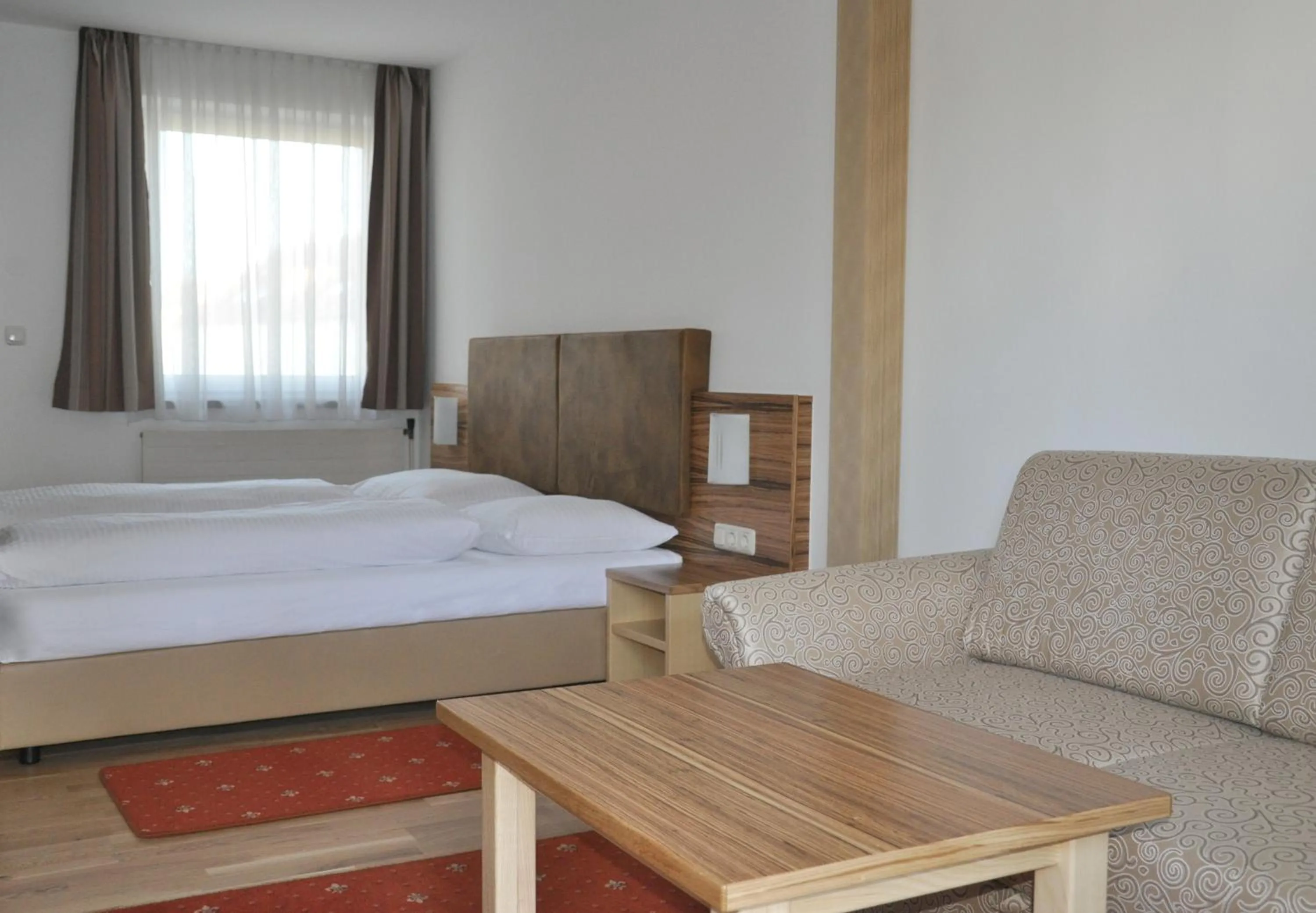 Bed in Hotel Almtalerhof