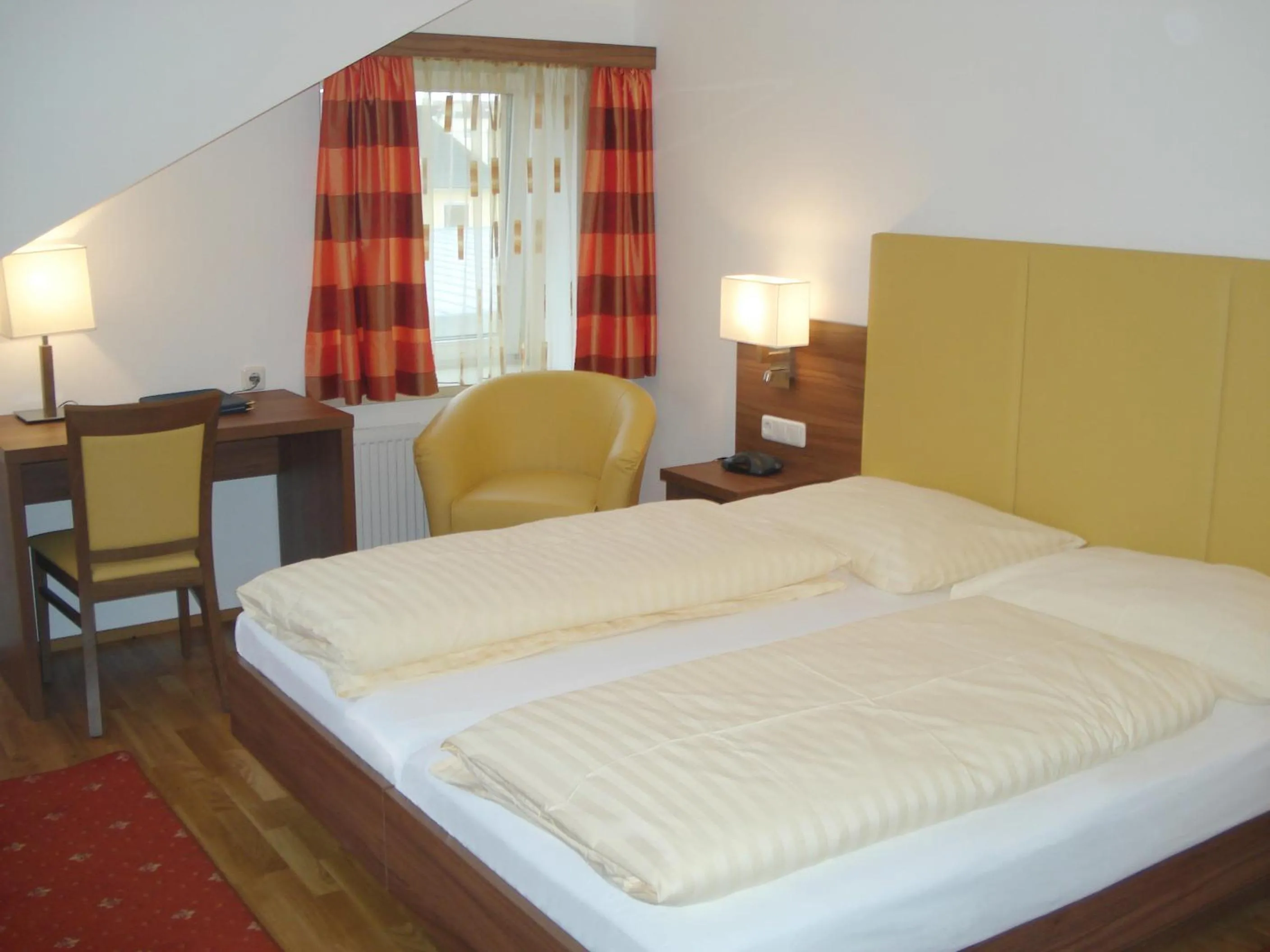 Bed in Hotel Almtalerhof
