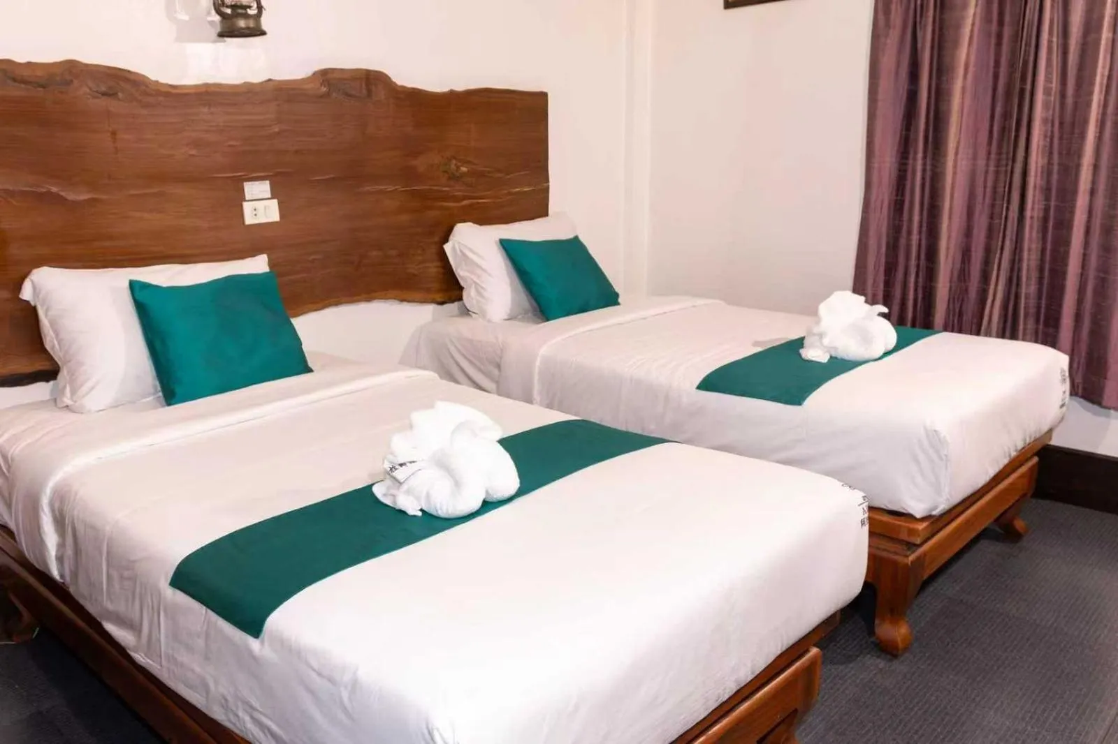 Bed in Alana Luang Prabang