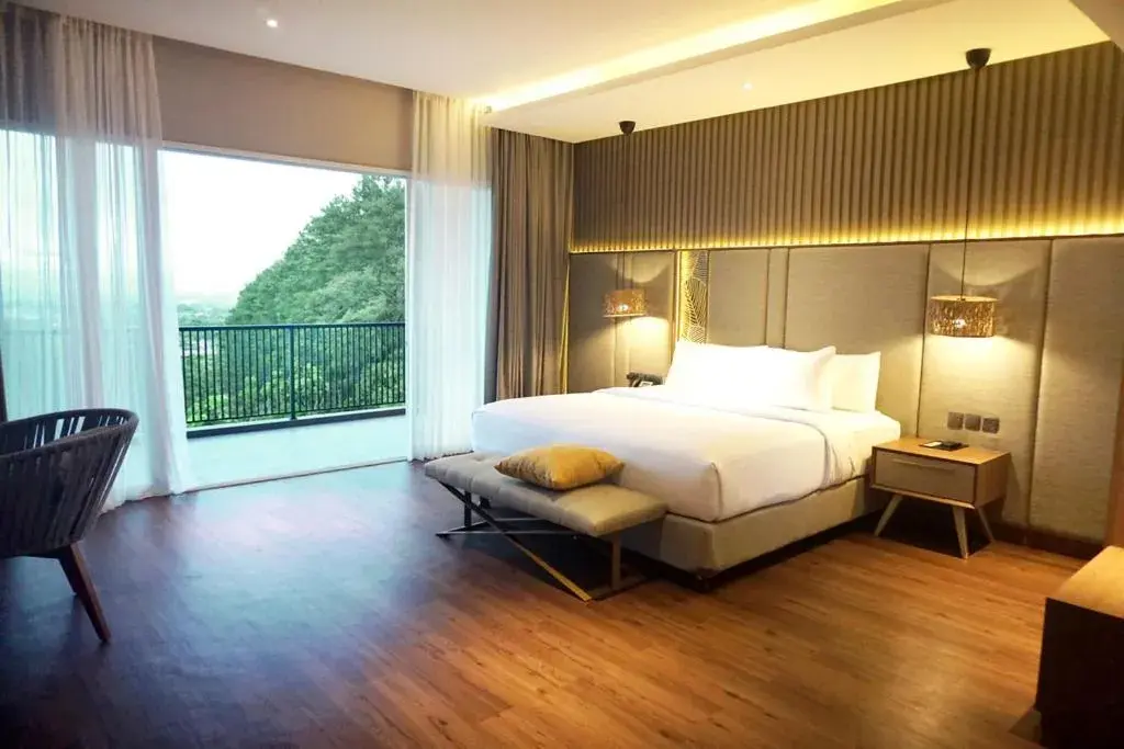 Bed in The Balcone Suites & Resort Bed in The Balcone Suites & Resort