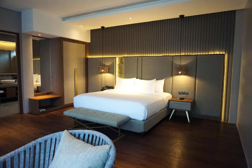 Bed in The Balcone Suites & Resort