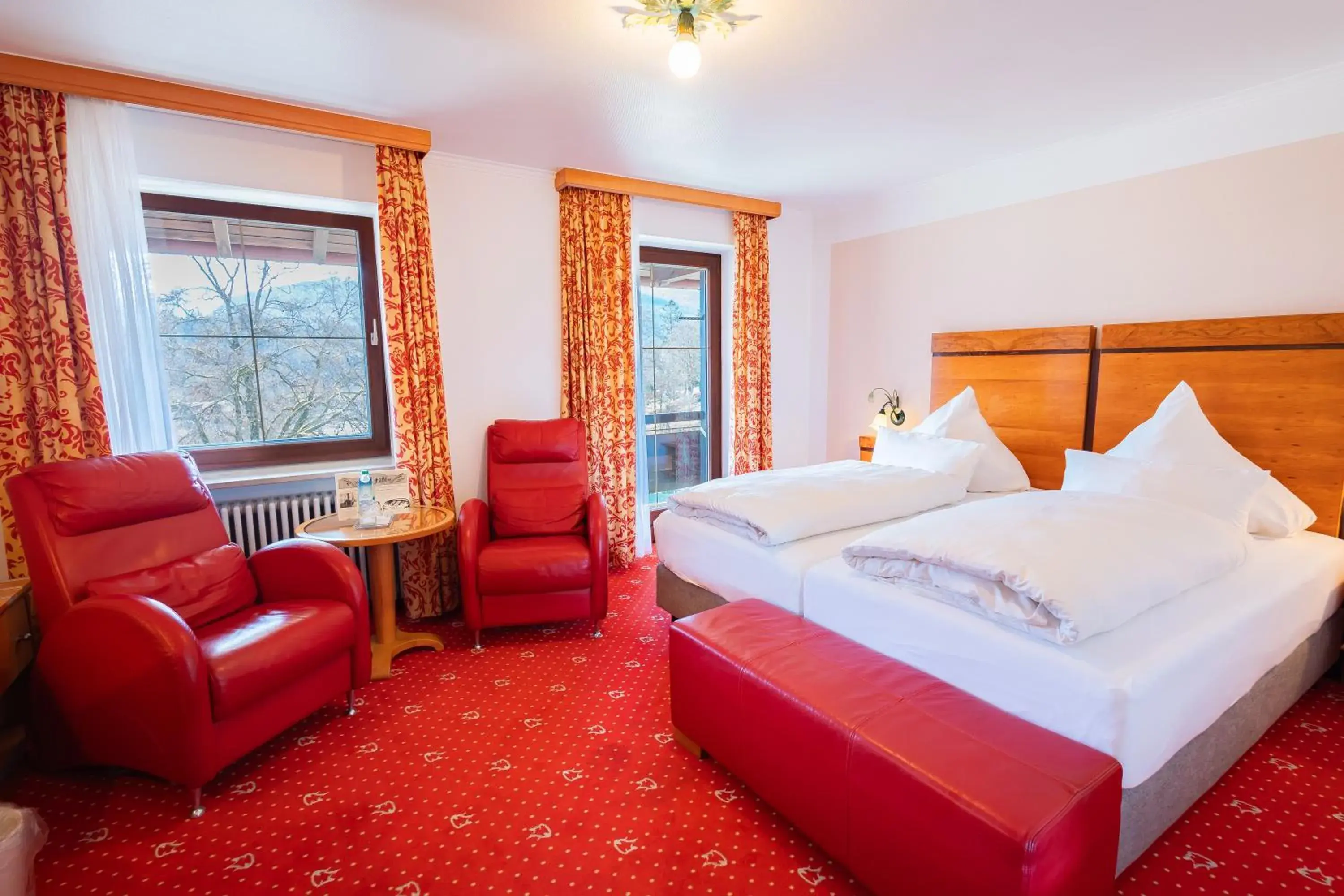 Photo of the whole room, Bed in Alpenhotel Kronprinz Photo of the whole room, Bed in Alpenhotel Kronprinz