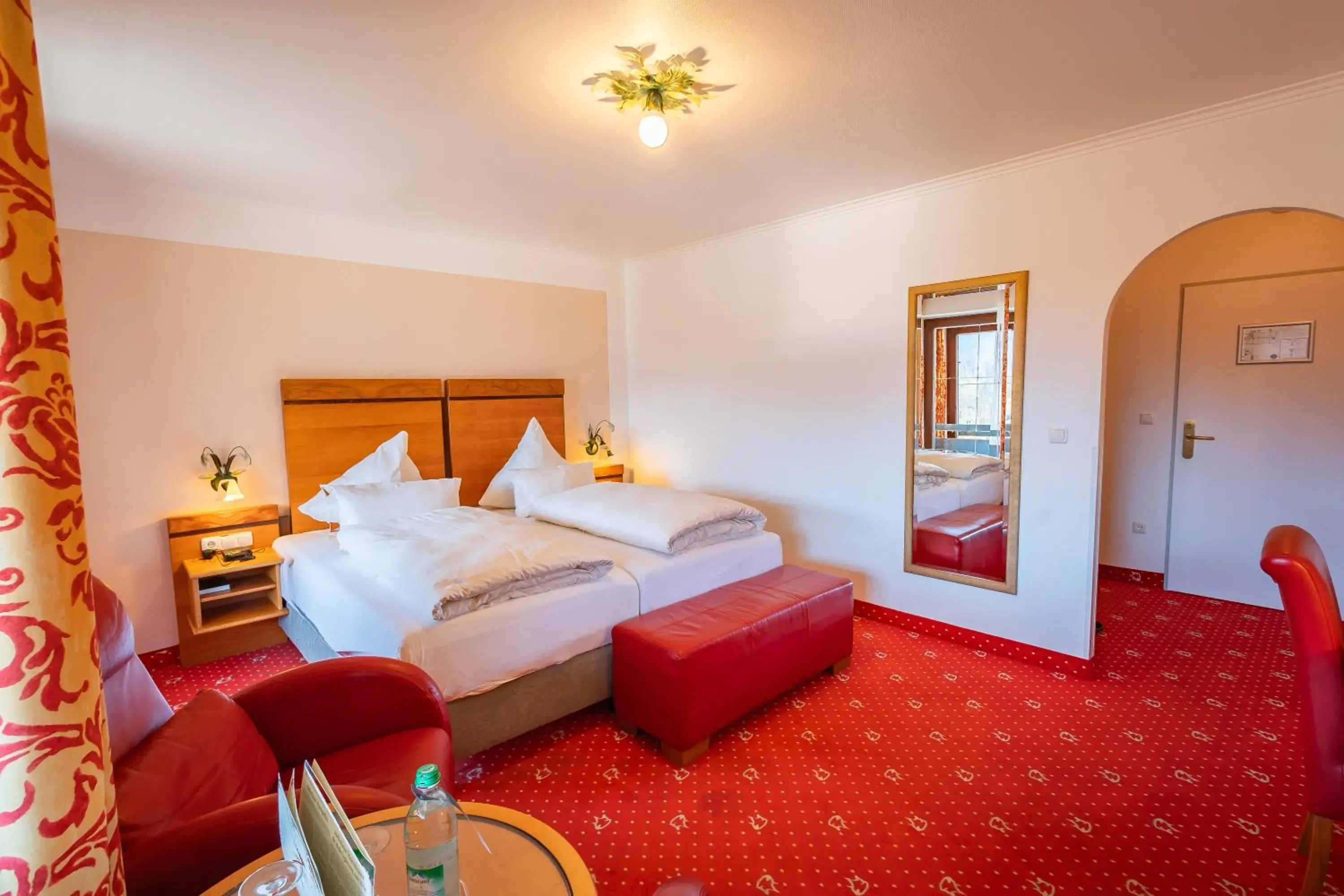 Bed in Alpenhotel Kronprinz Bed in Alpenhotel Kronprinz