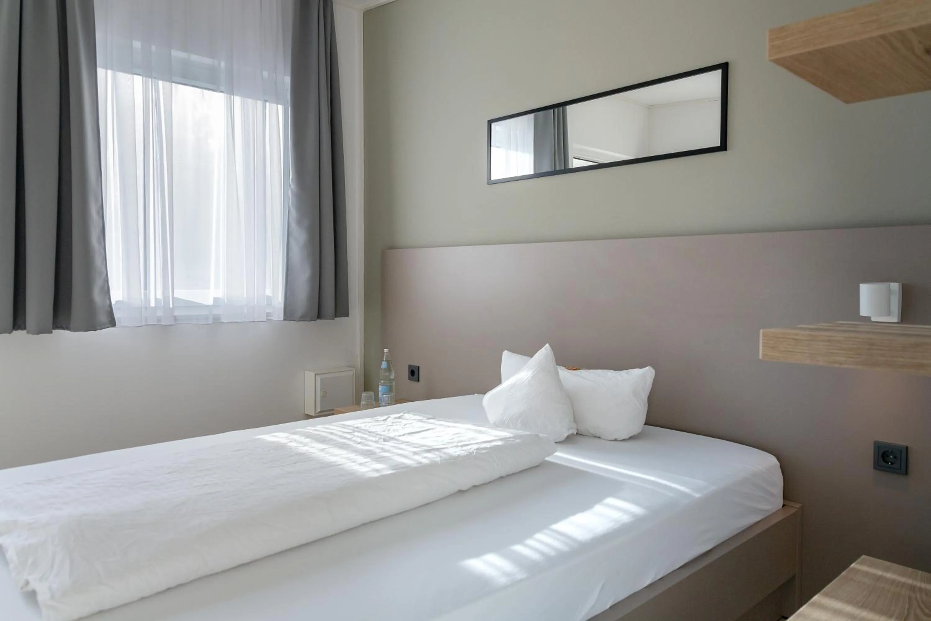 Bed in Hotel Lüneburg Süd