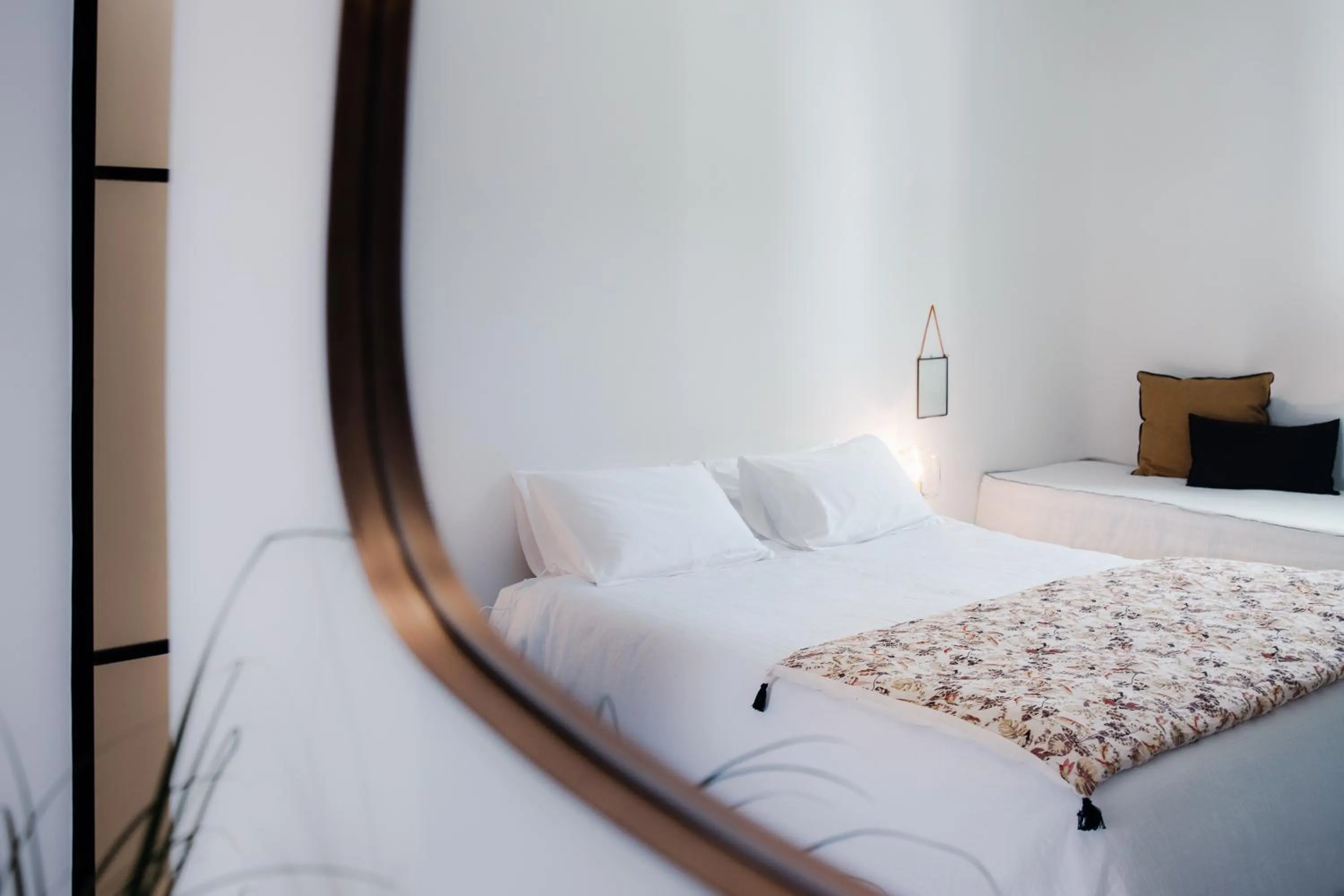 Bed in Koukoumi Vegan Boutique Hotel