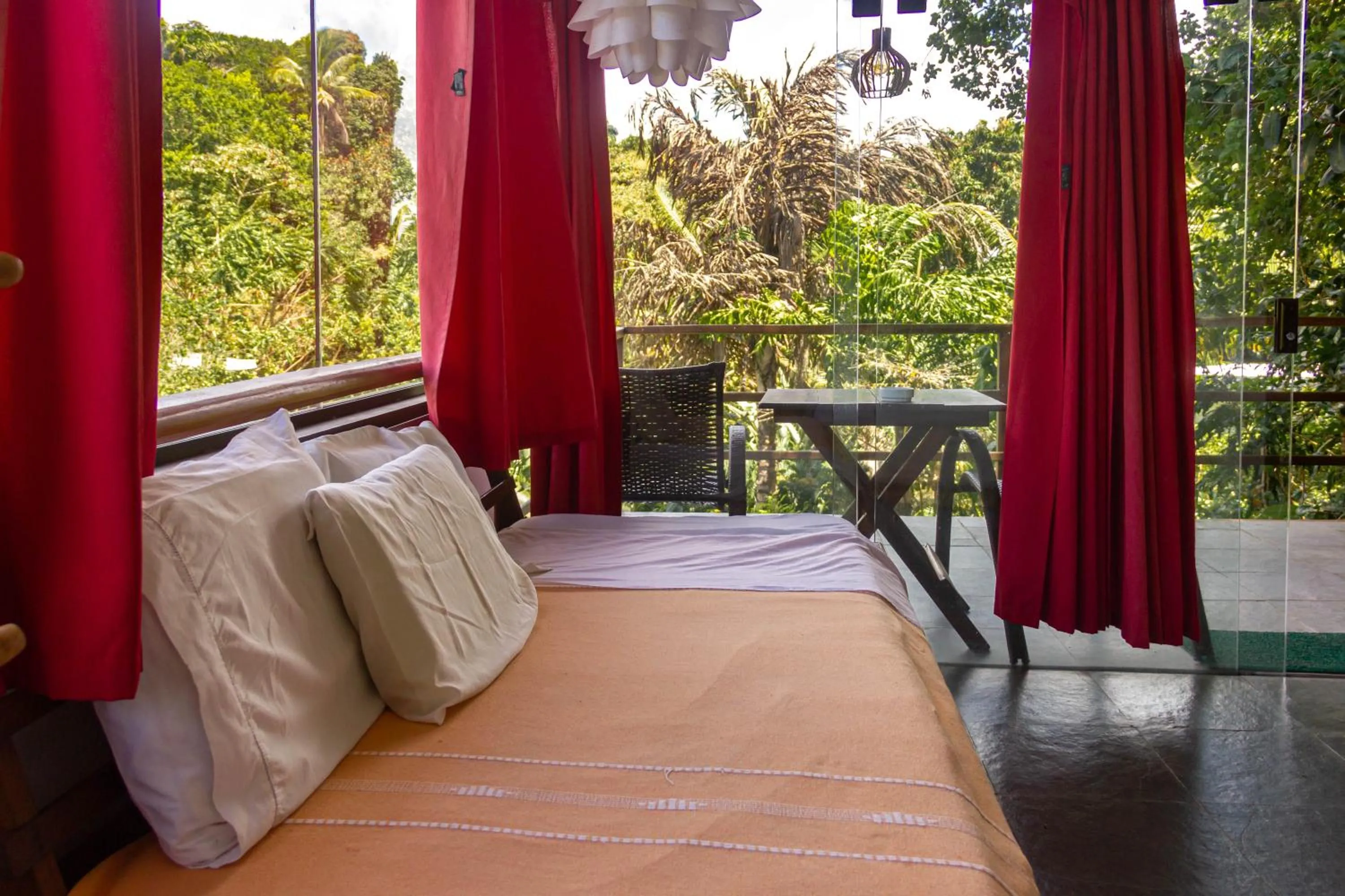 Bed in Pousada Aquarela