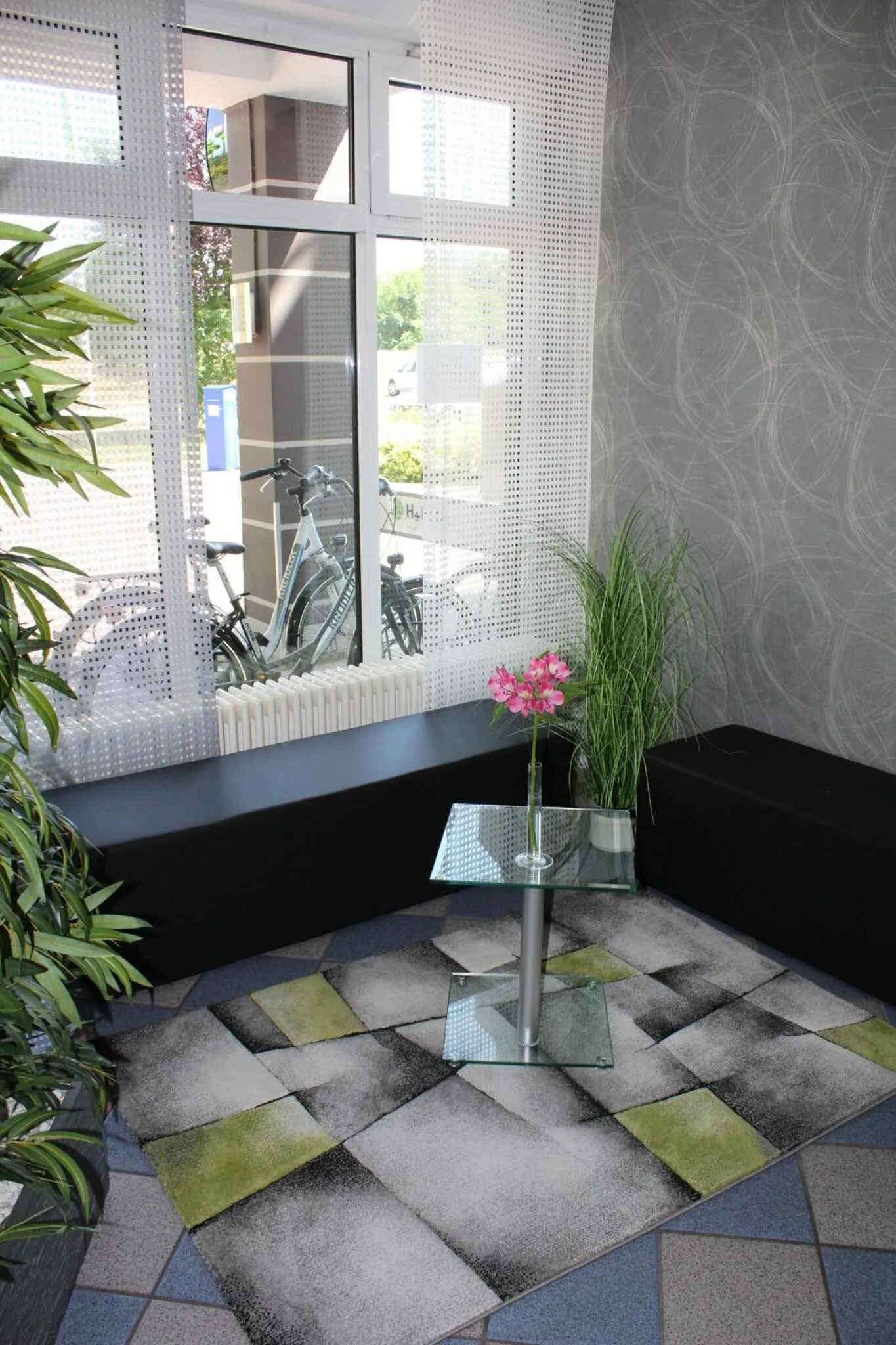 Lobby or reception in H+ Hotel Erfurt