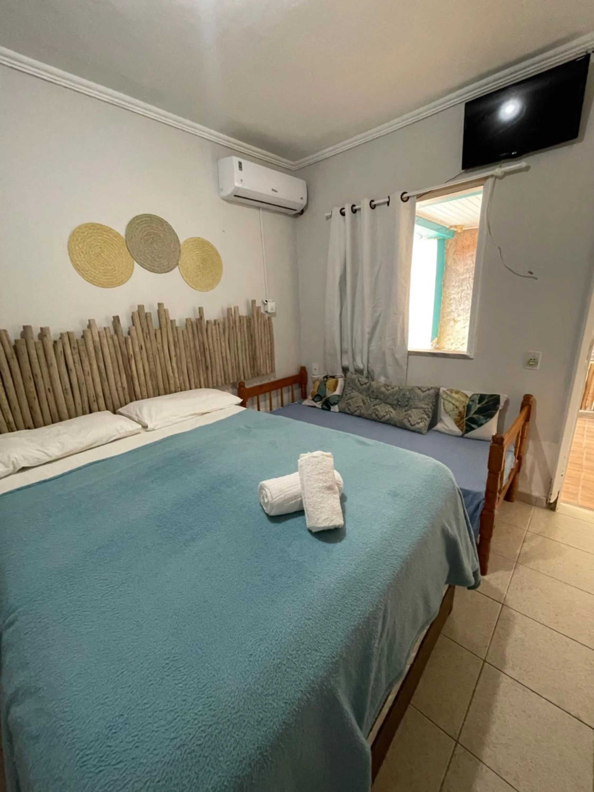 Bed in Pousada Nativo