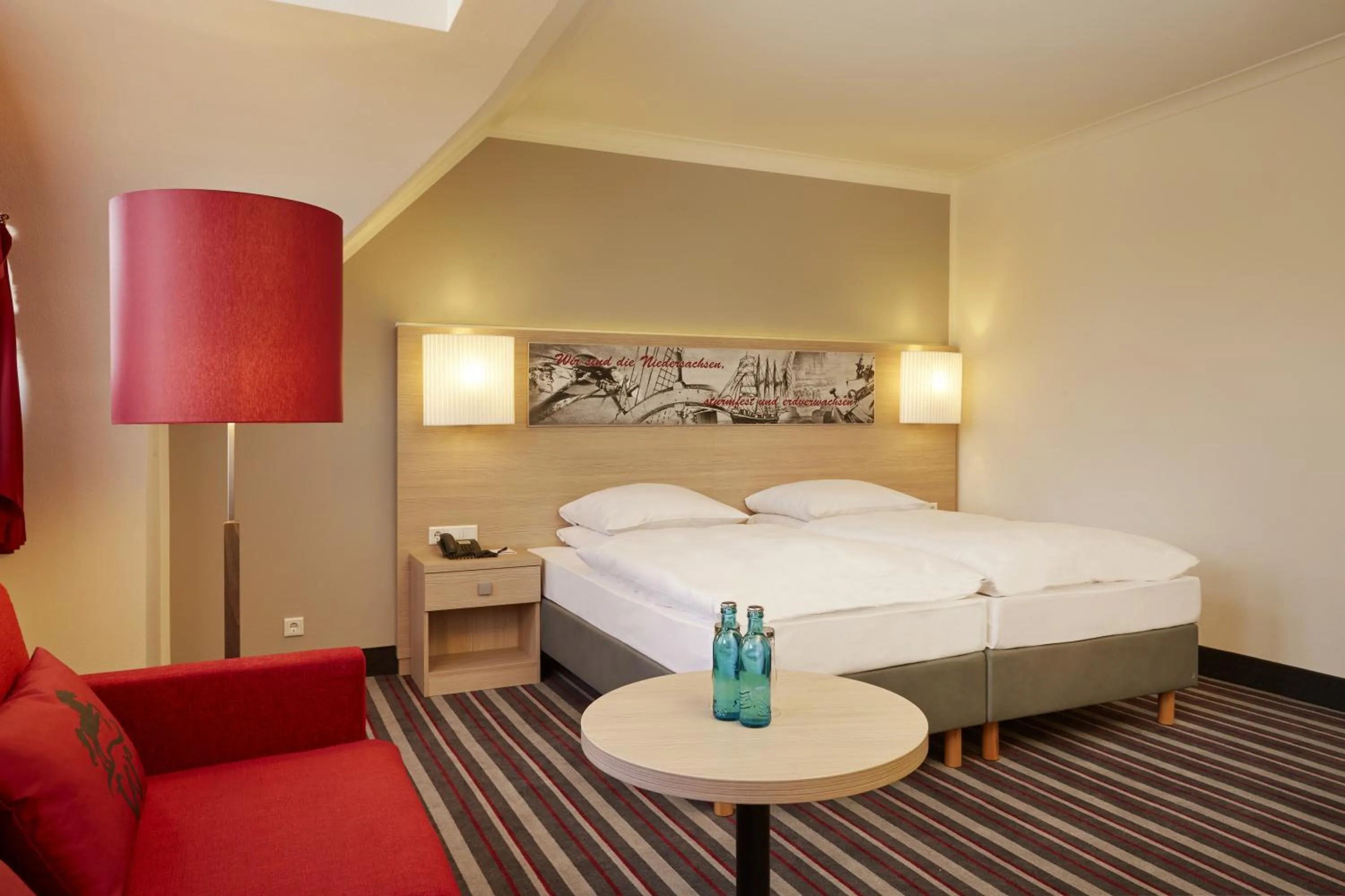 Photo of the whole room, Bed in H+ Hotel Stade Herzog Widukind