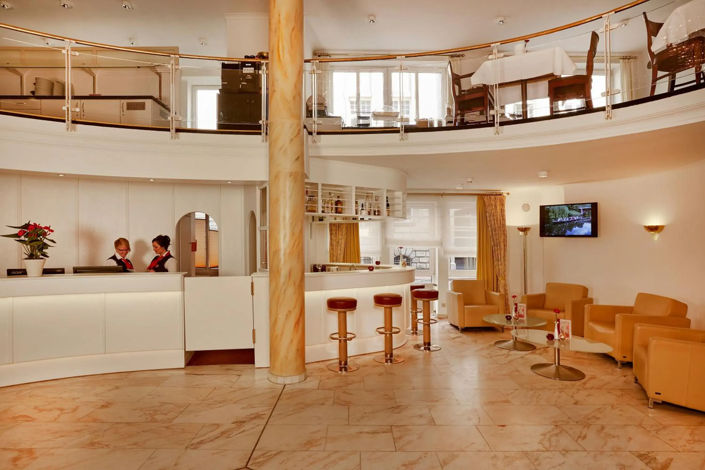 Lobby or reception in H+ Hotel Stade Herzog Widukind Lobby or reception in H+ Hotel Stade Herzog Widukind