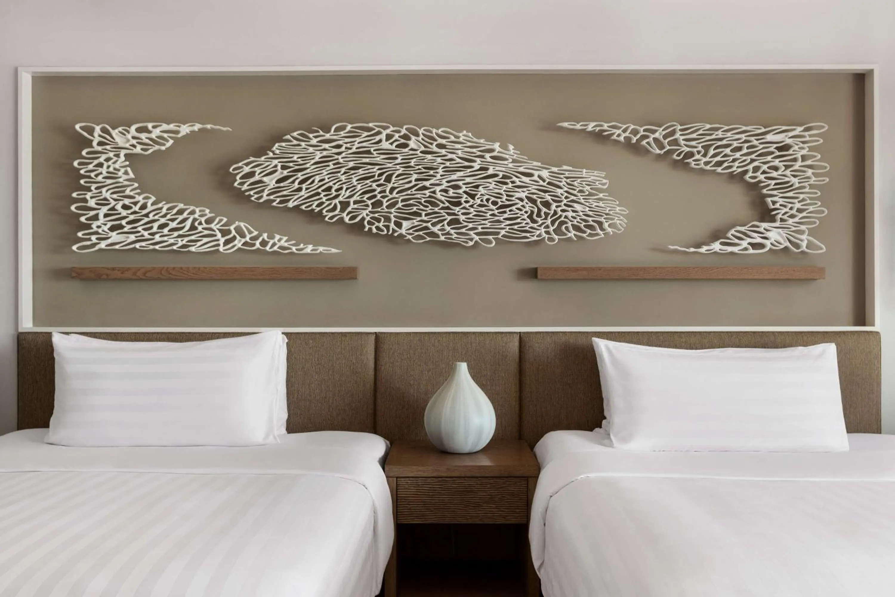 Decorative detail, Bed in Shangri-La Le Touessrok, Mauritius