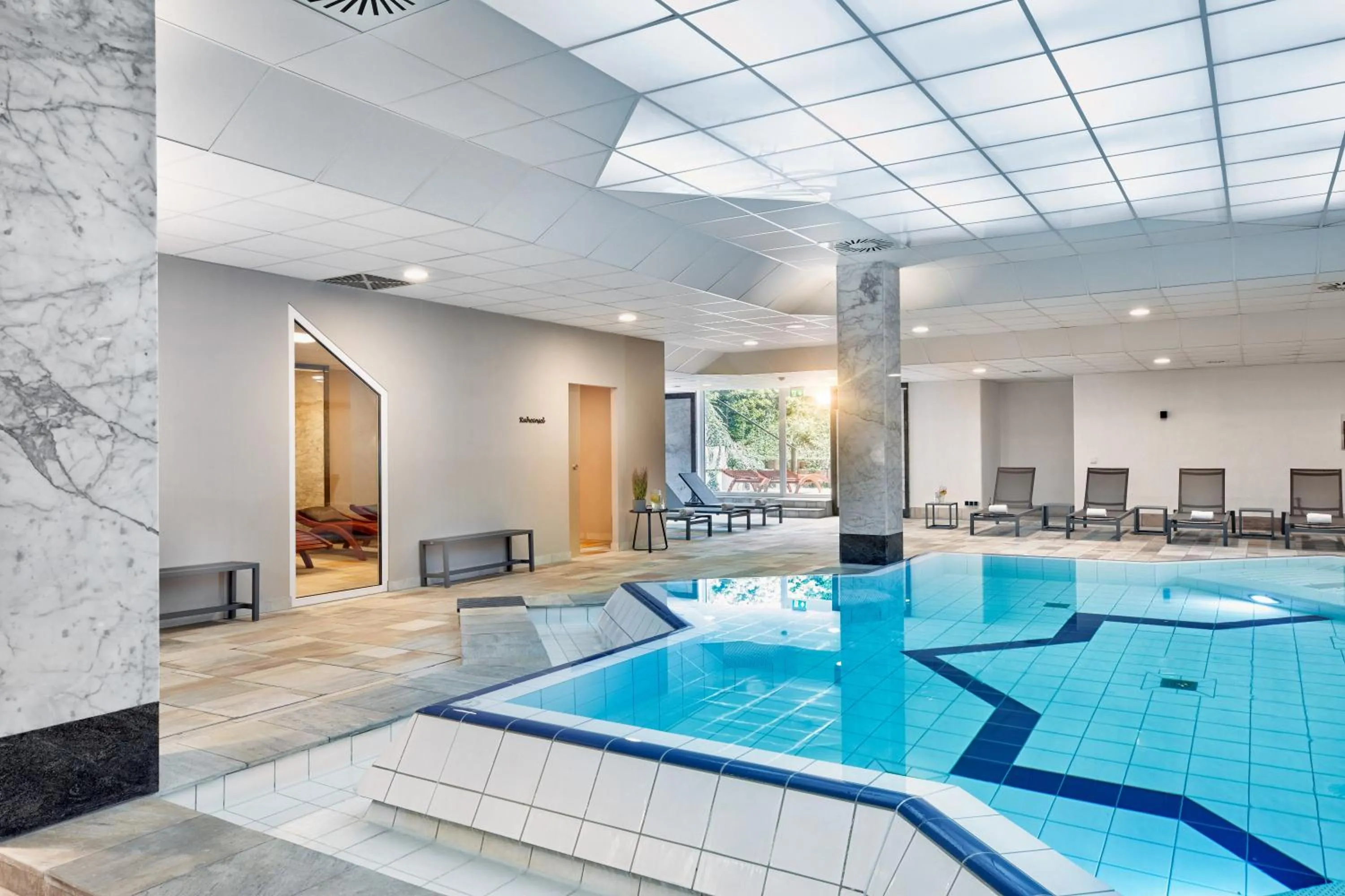 Swimming pool in H+ Hotel Wiesbaden Niedernhausen