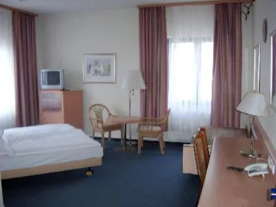 Bedroom, Bed in Hotel Christinenhof garni - Bed & Breakfast