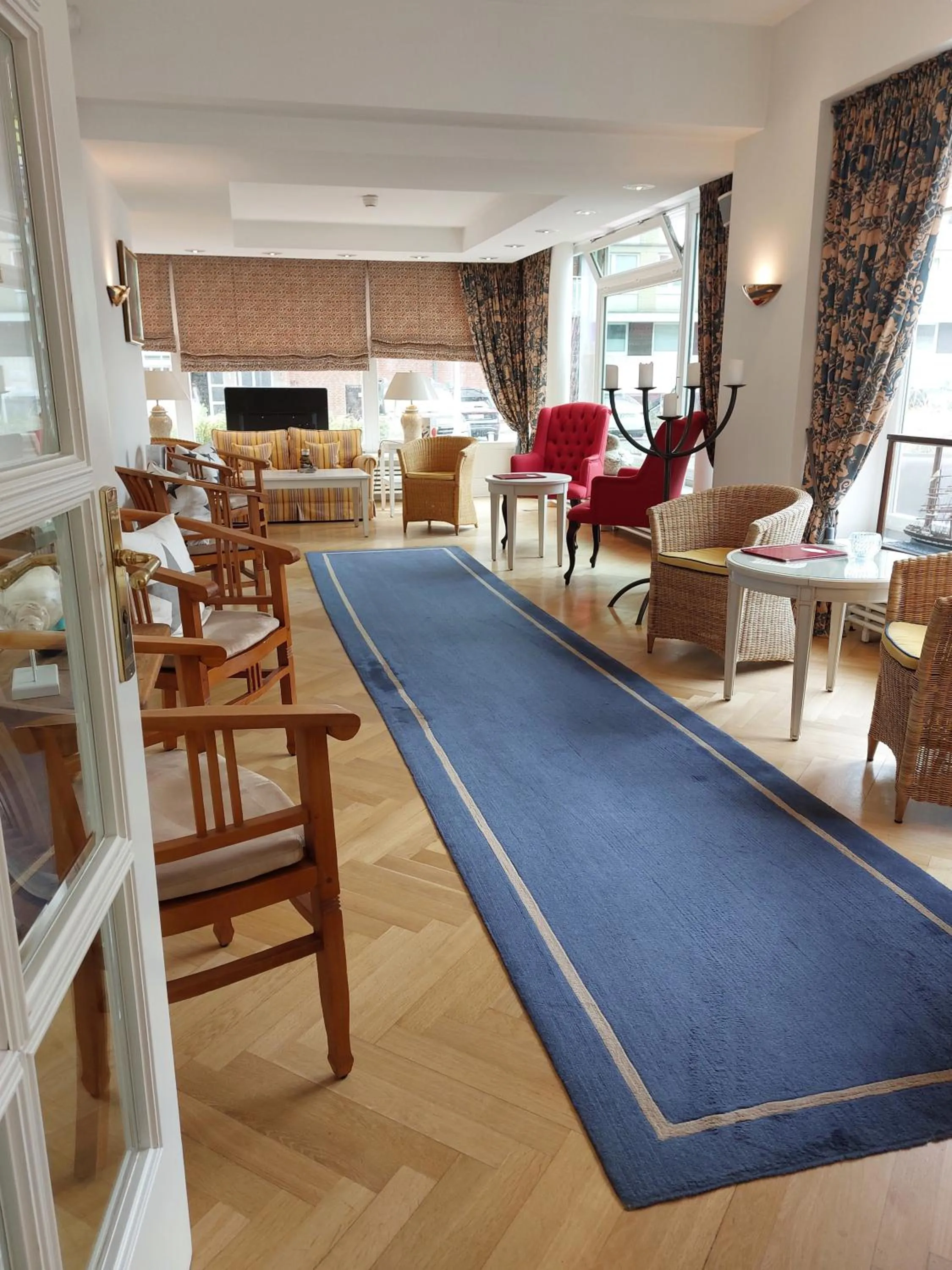 Communal lounge/ TV room in Hotel Wünschmann