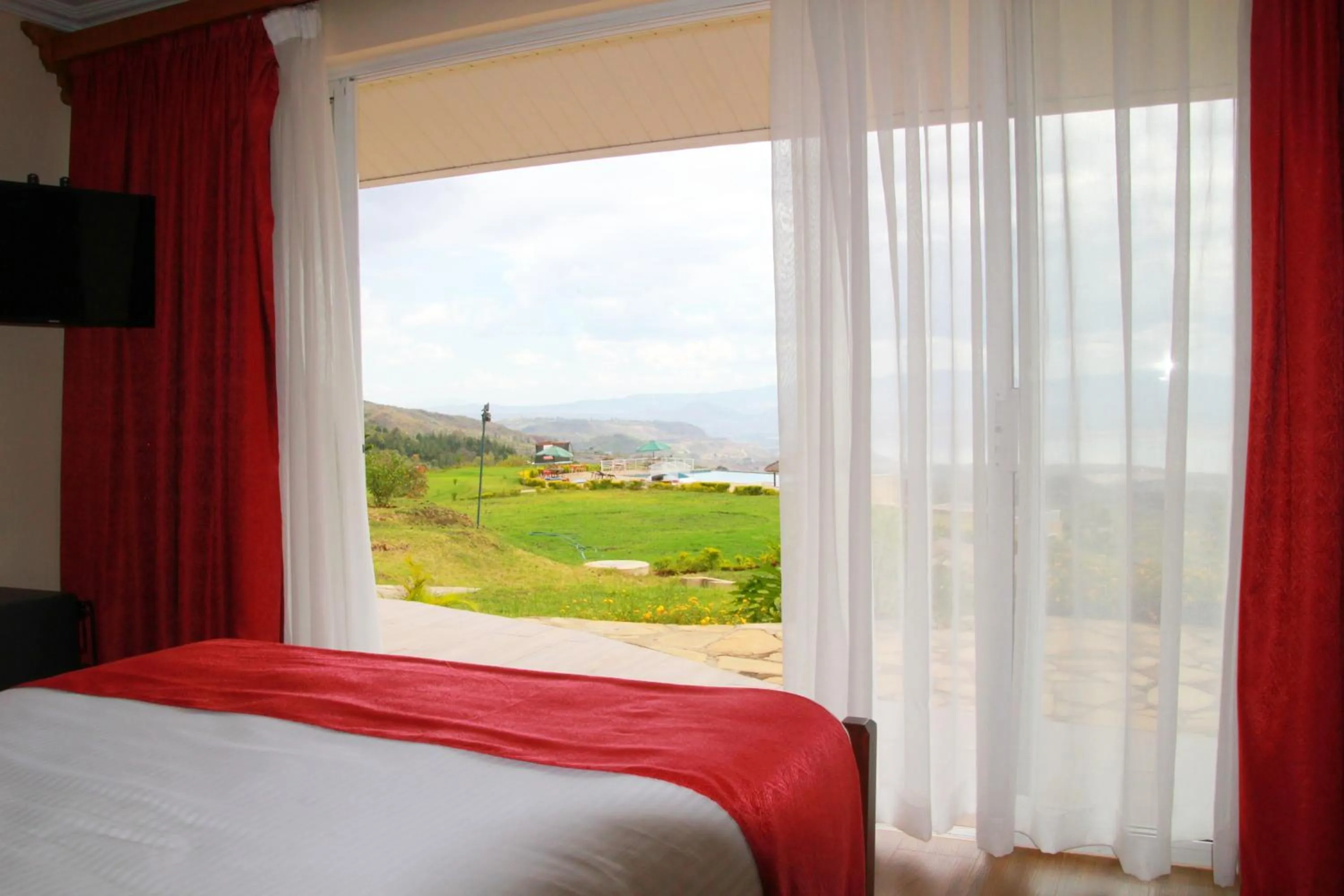 Bed in Lake Elementaita Mountain Lodge