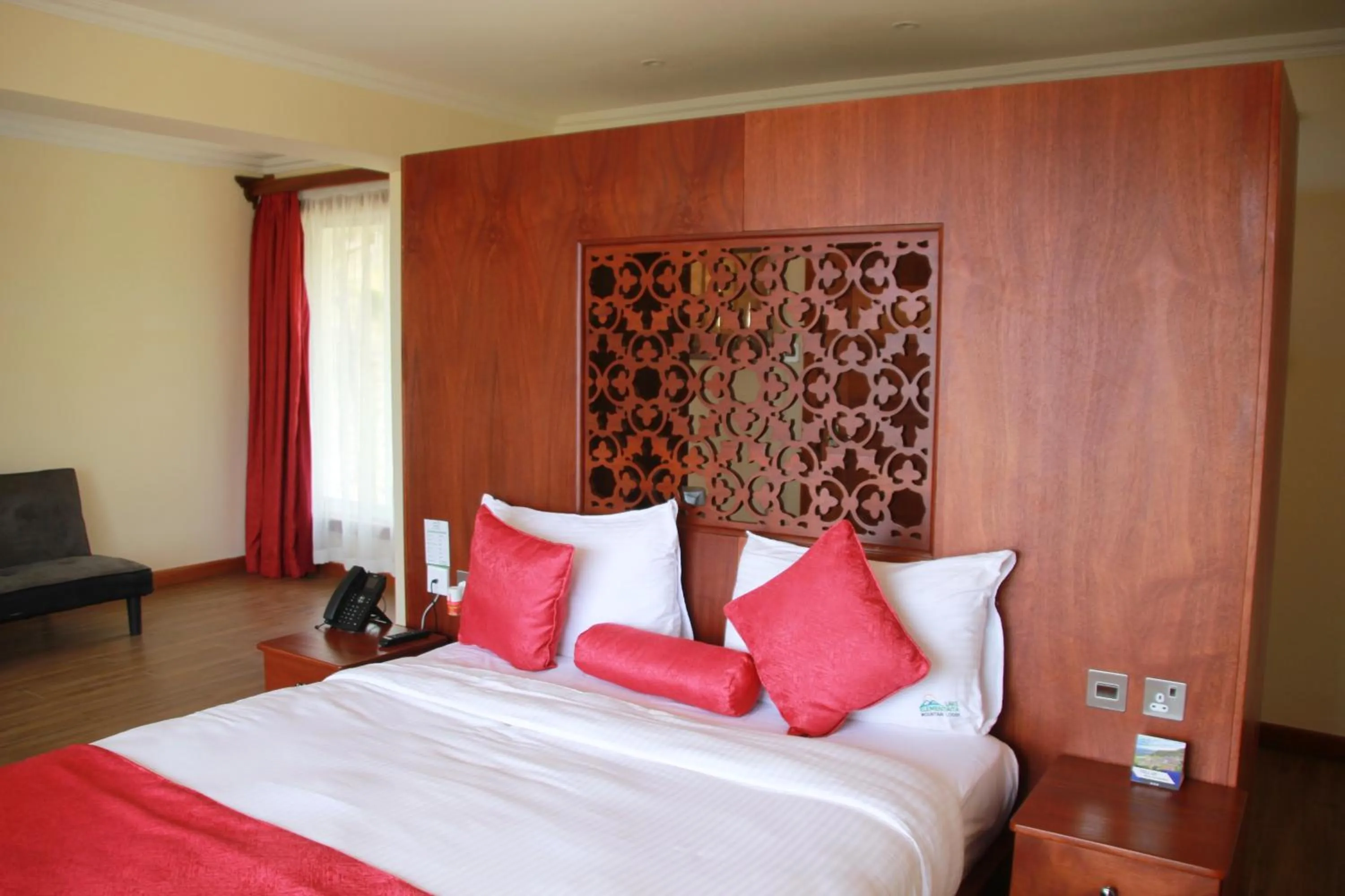 Bed in Lake Elementaita Mountain Lodge