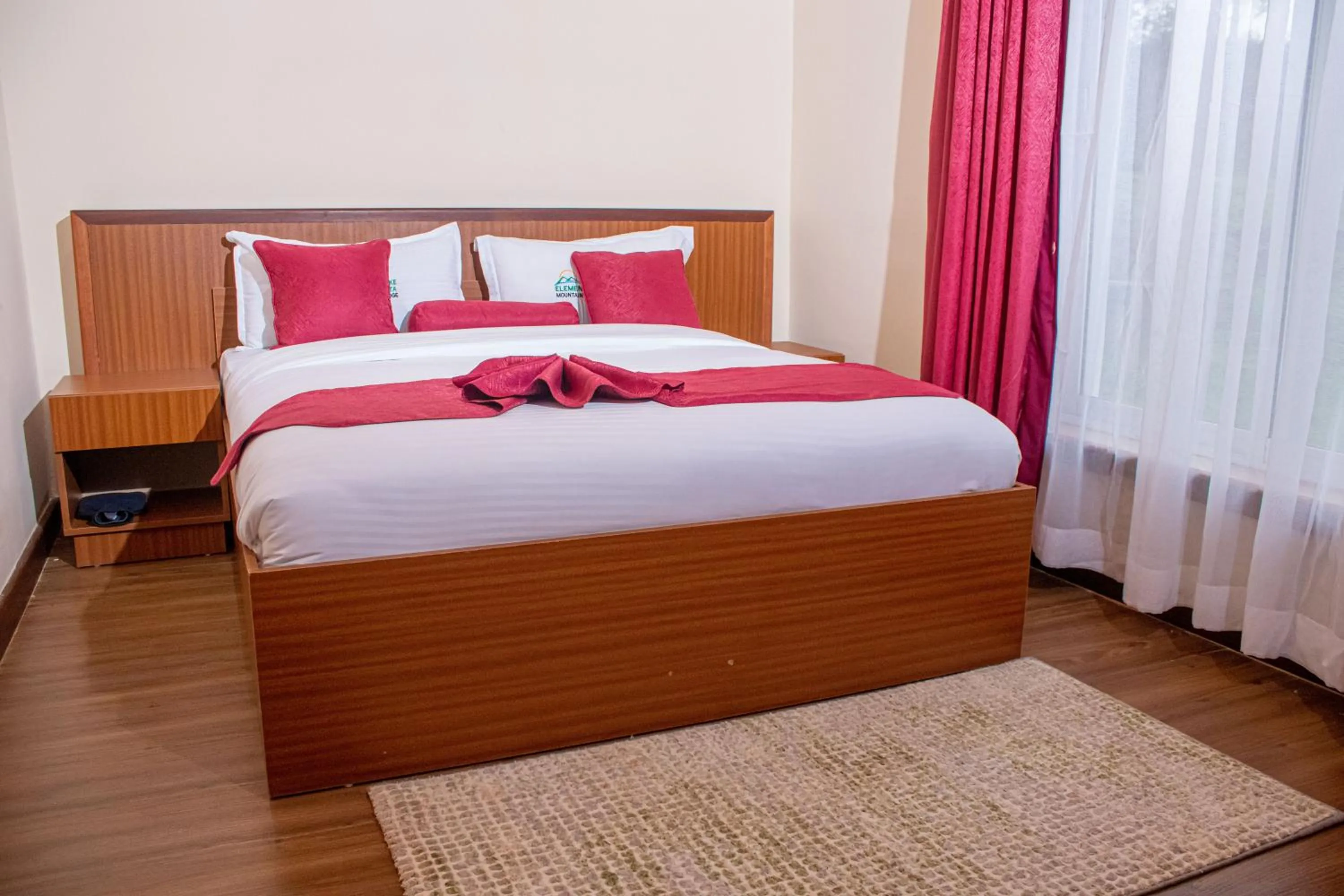 Bed in Lake Elementaita Mountain Lodge